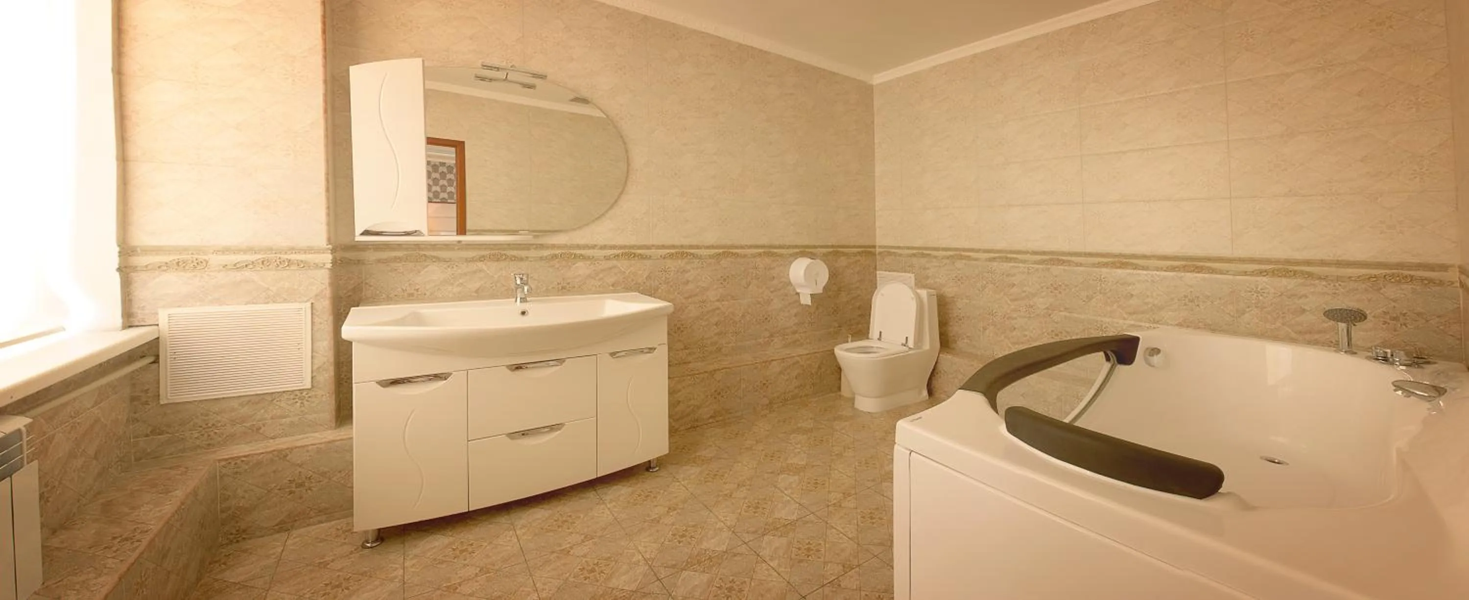 Bathroom in Almaty Grand Erbil Hotel