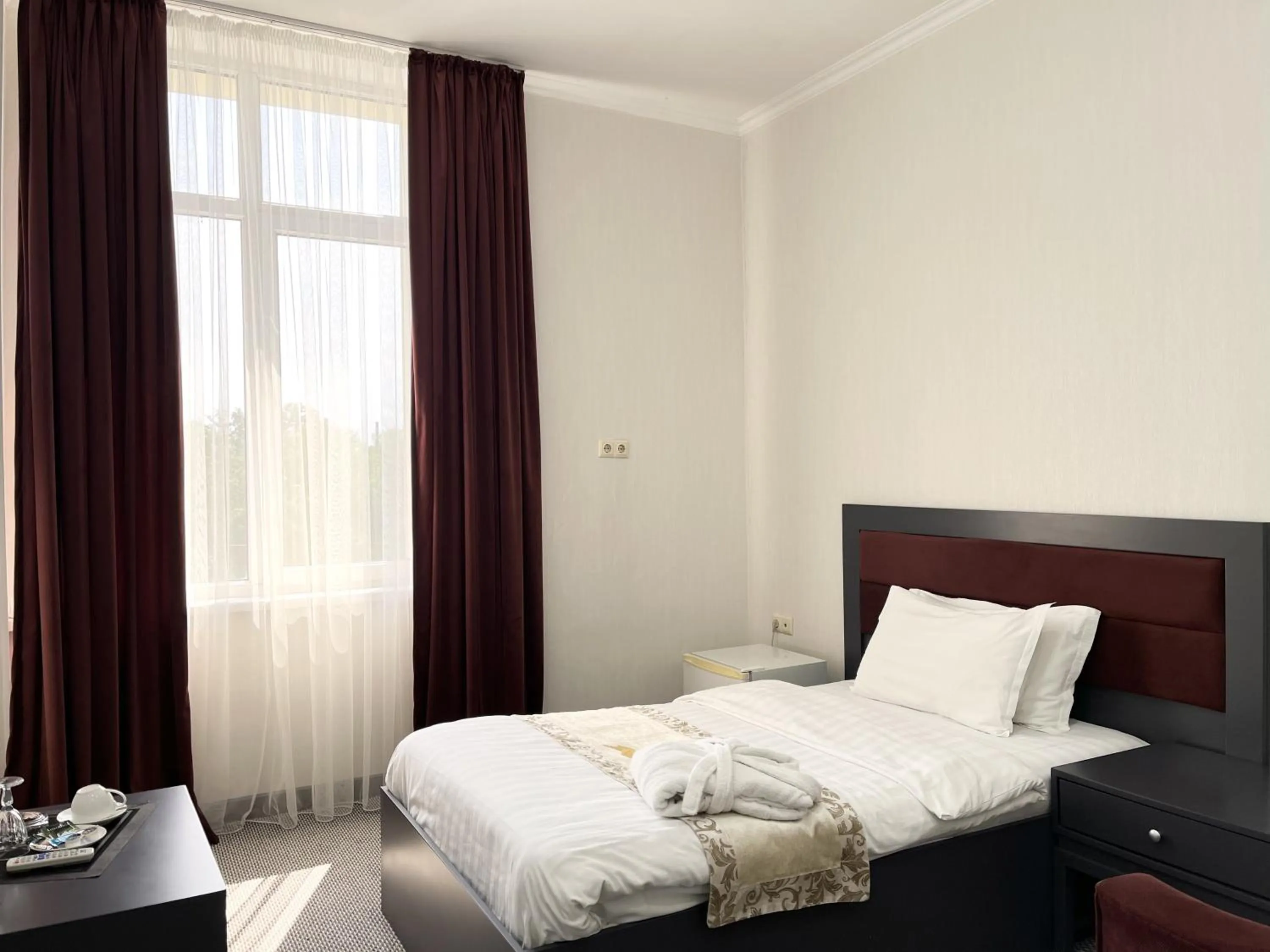 Bed in Almaty Grand Erbil Hotel