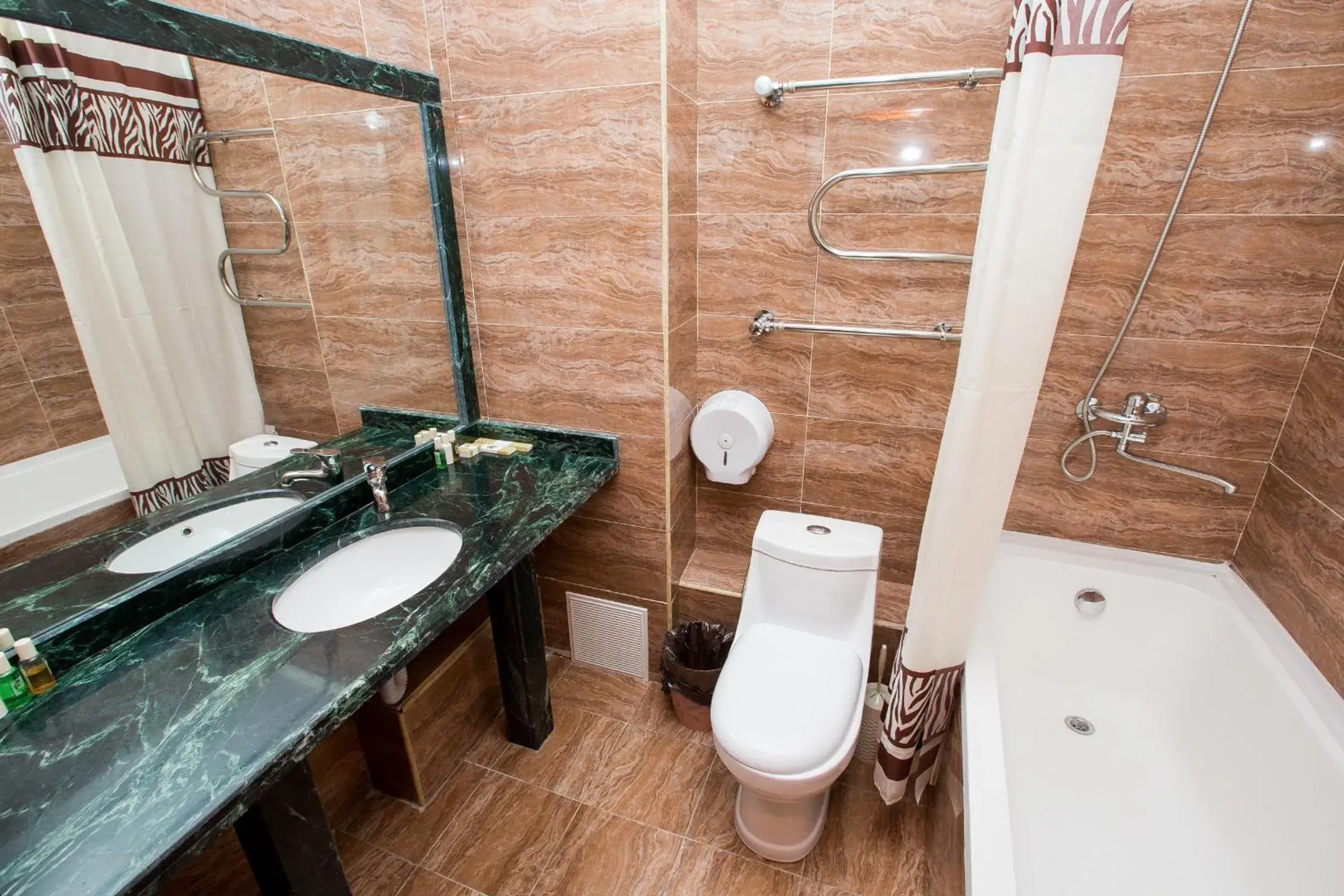 Bathroom in Almaty Grand Erbil Hotel Bathroom in Almaty Grand Erbil Hotel