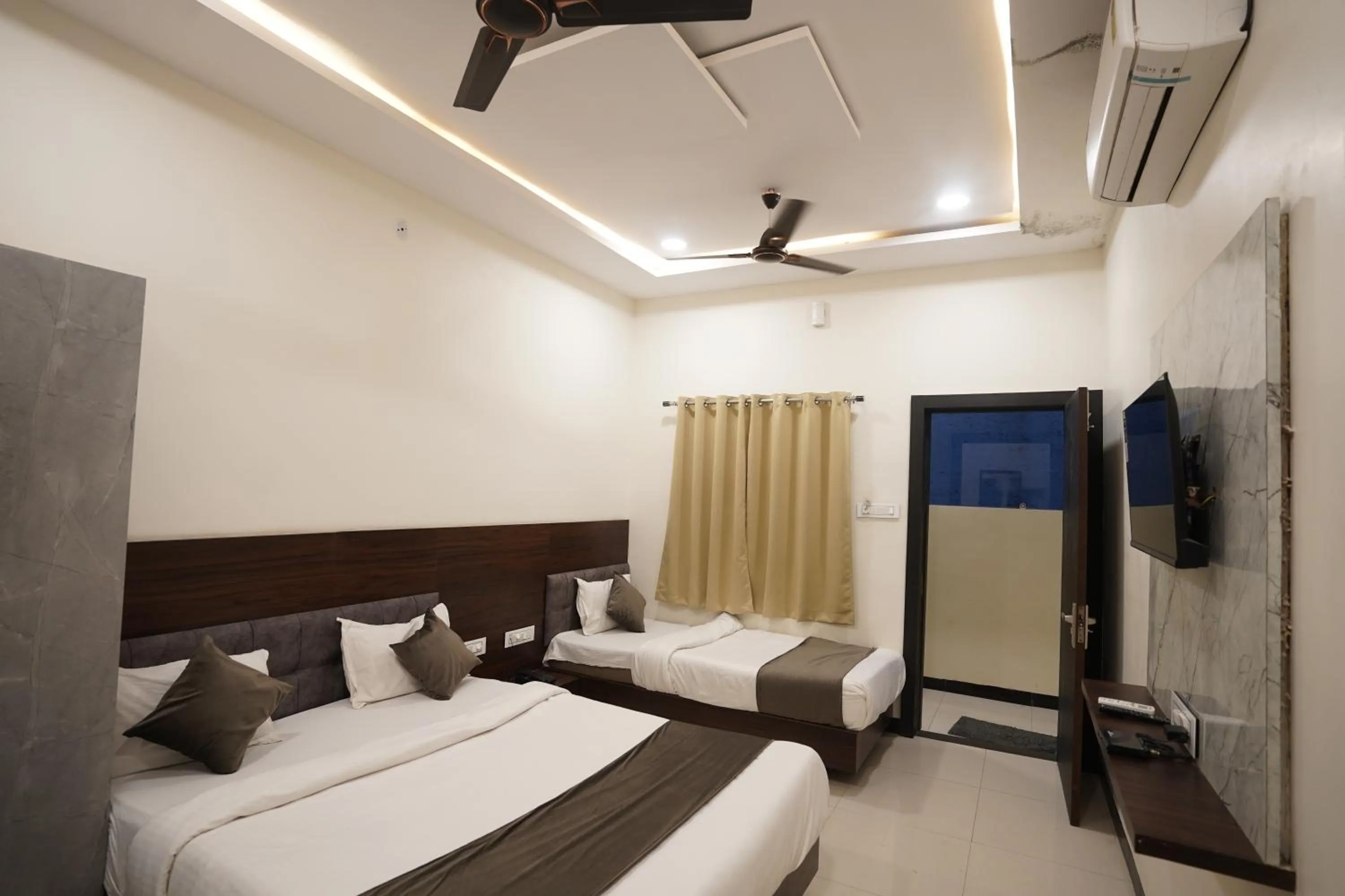 Bed in Hotel Dev Kripa