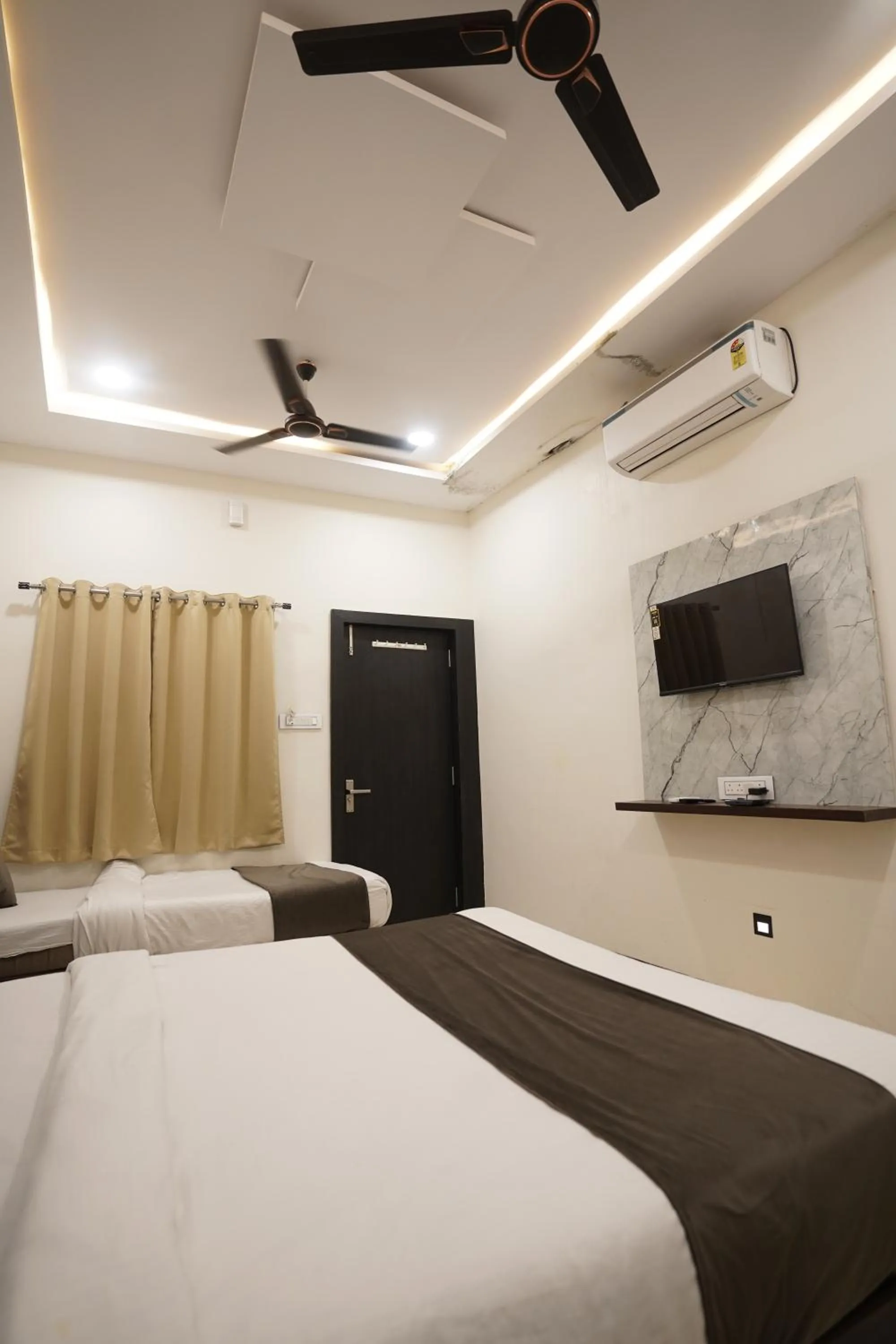 Bed in Hotel Dev Kripa