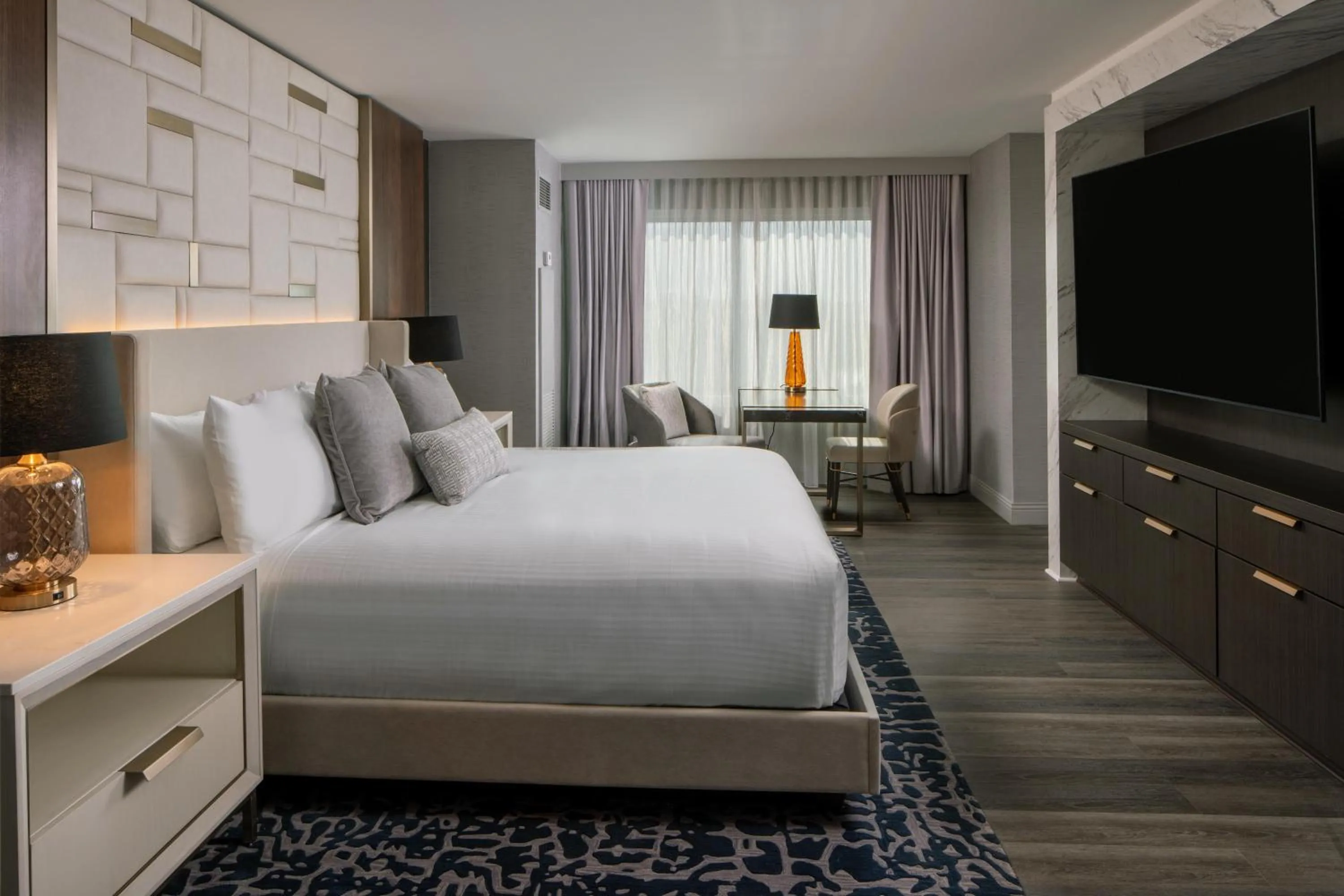 Living room, Bed in Live Casino & Hotel Louisiana, Curio Collection by Hilton
