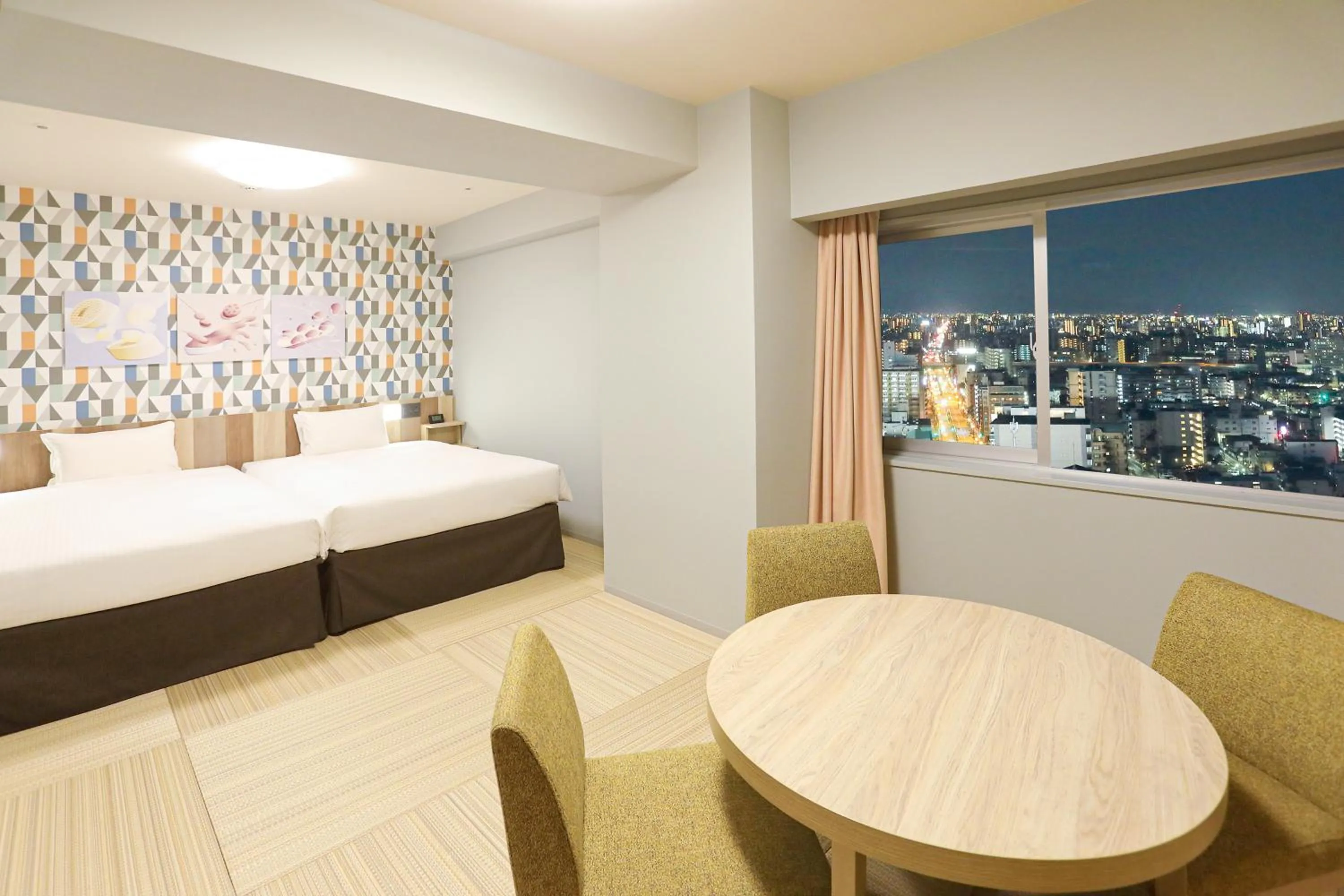 Bed in Hiyori Hotel Osaka Suminoekoen Station