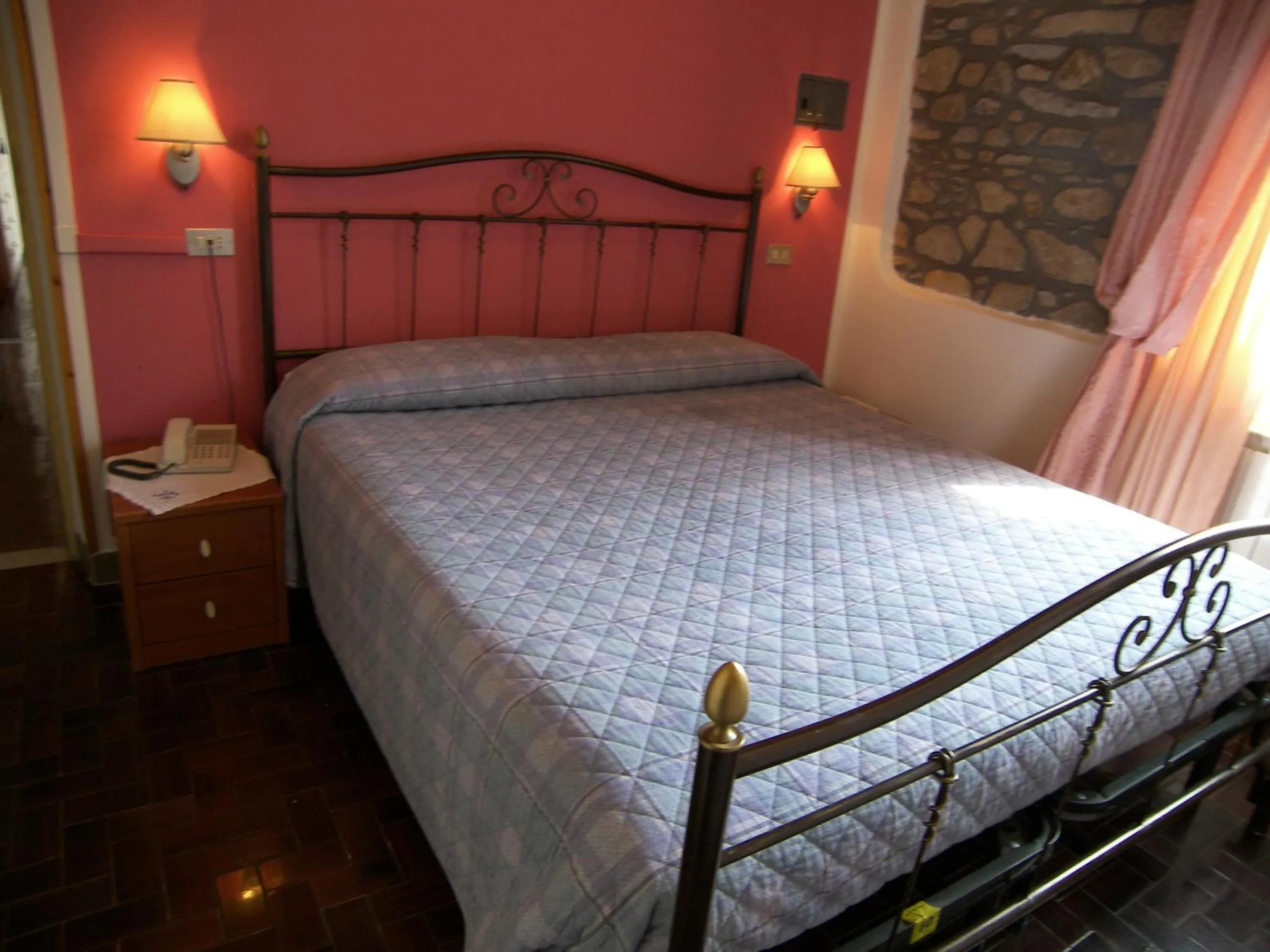 Photo of the whole room, Bed in Albergo Elisa