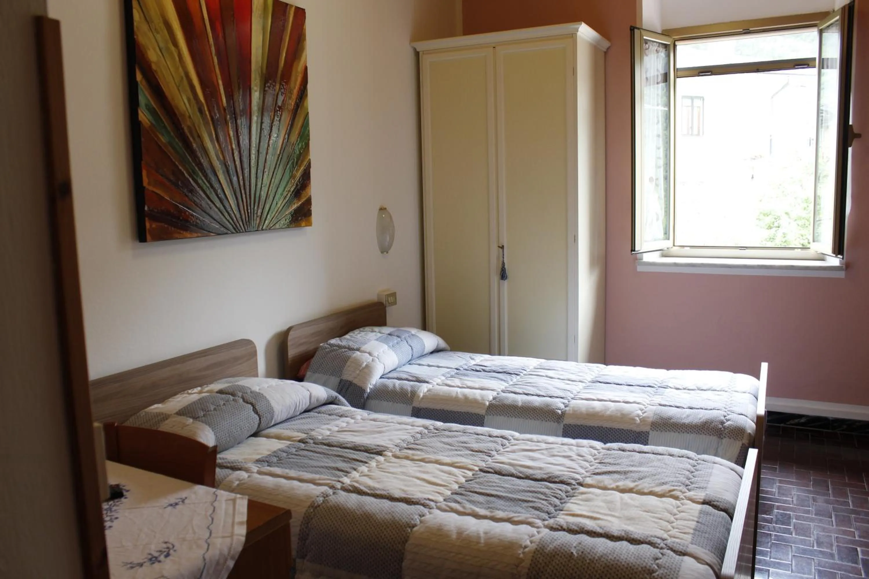 Photo of the whole room, Bed in Albergo Elisa