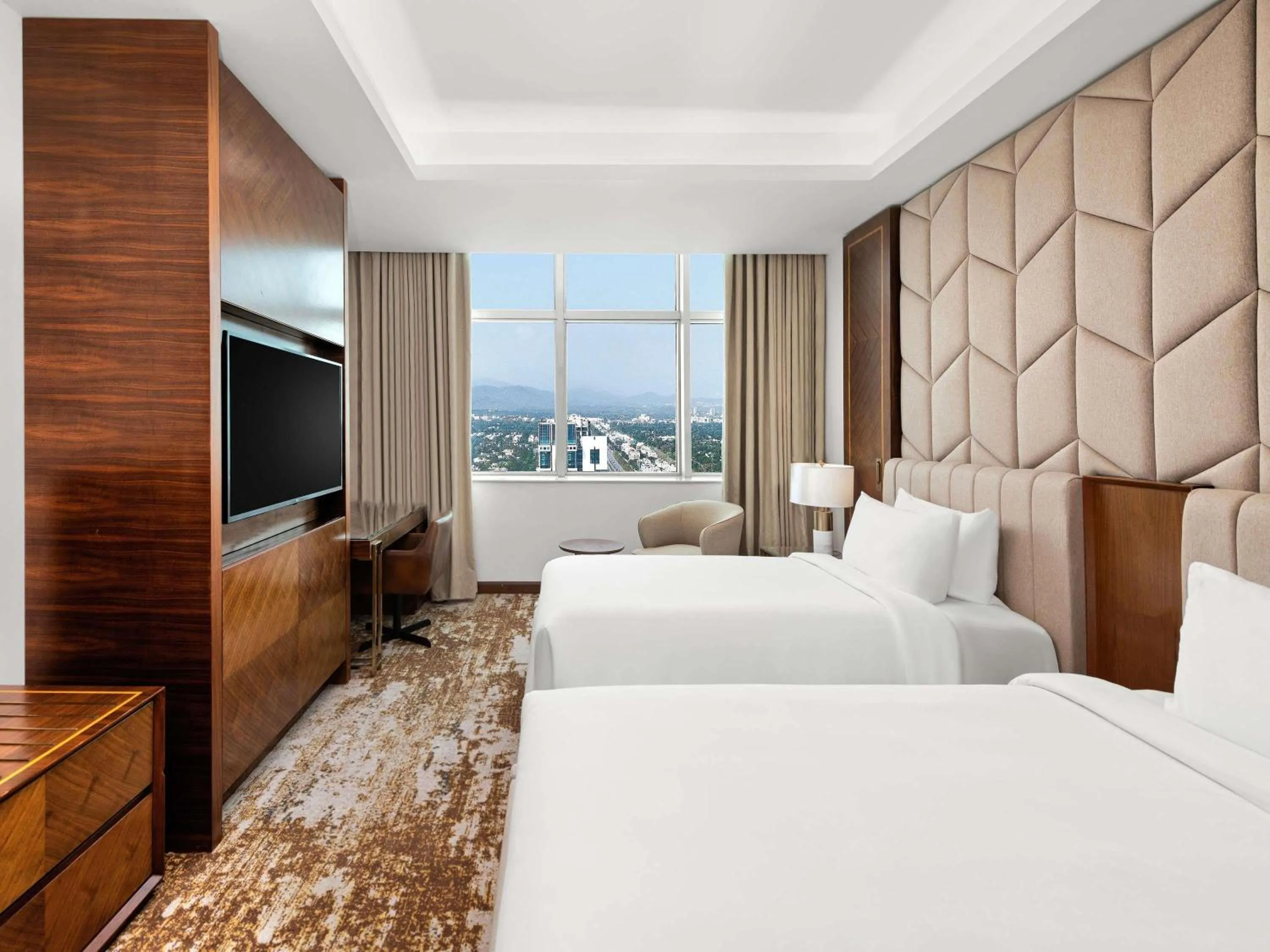 Bedroom, Bed in Movenpick Hotel Centaurus Islamabad