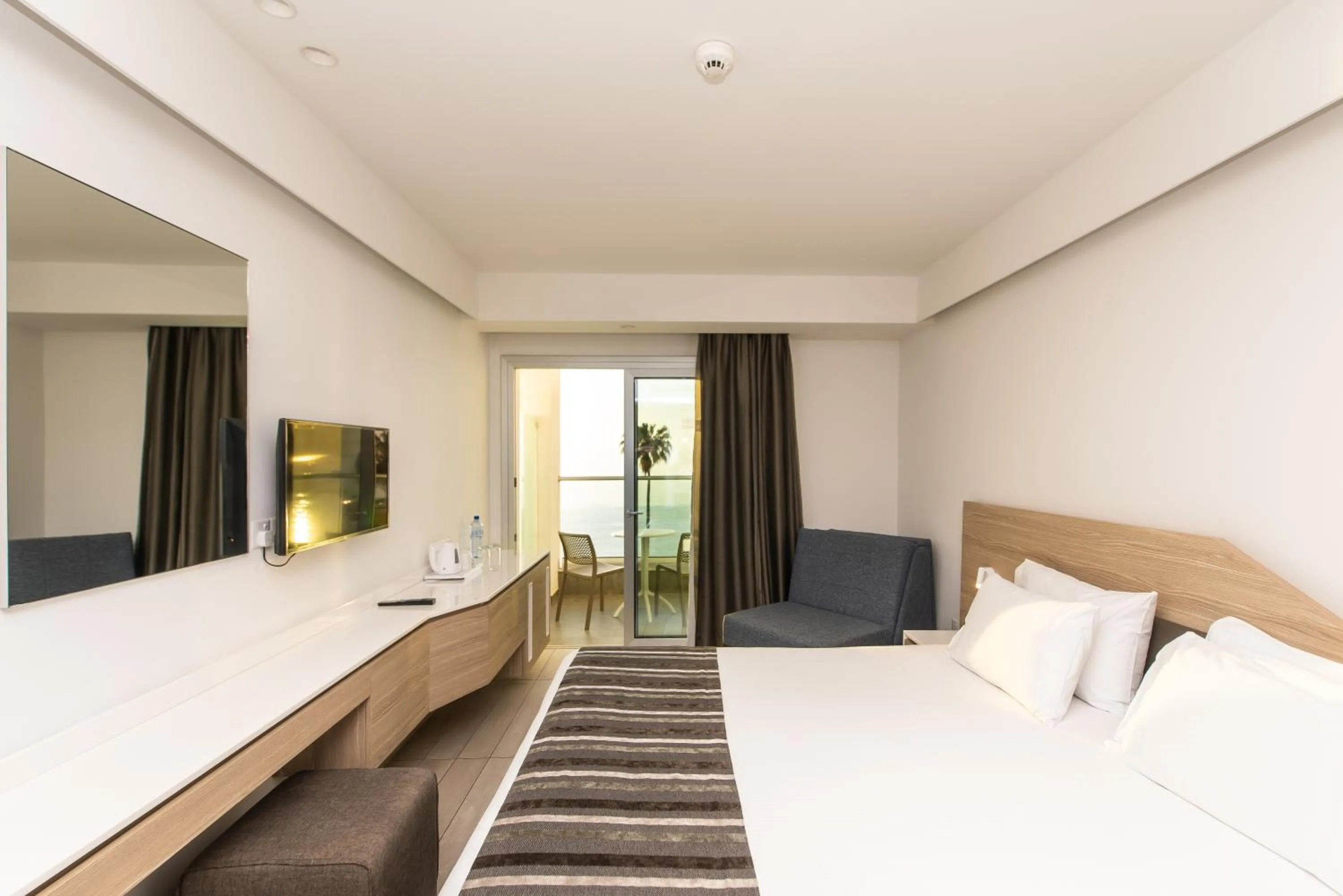 Bedroom in Evalena Beach Hotel