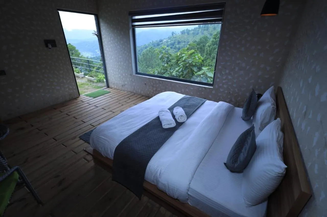 Bed in Anupraas Resort