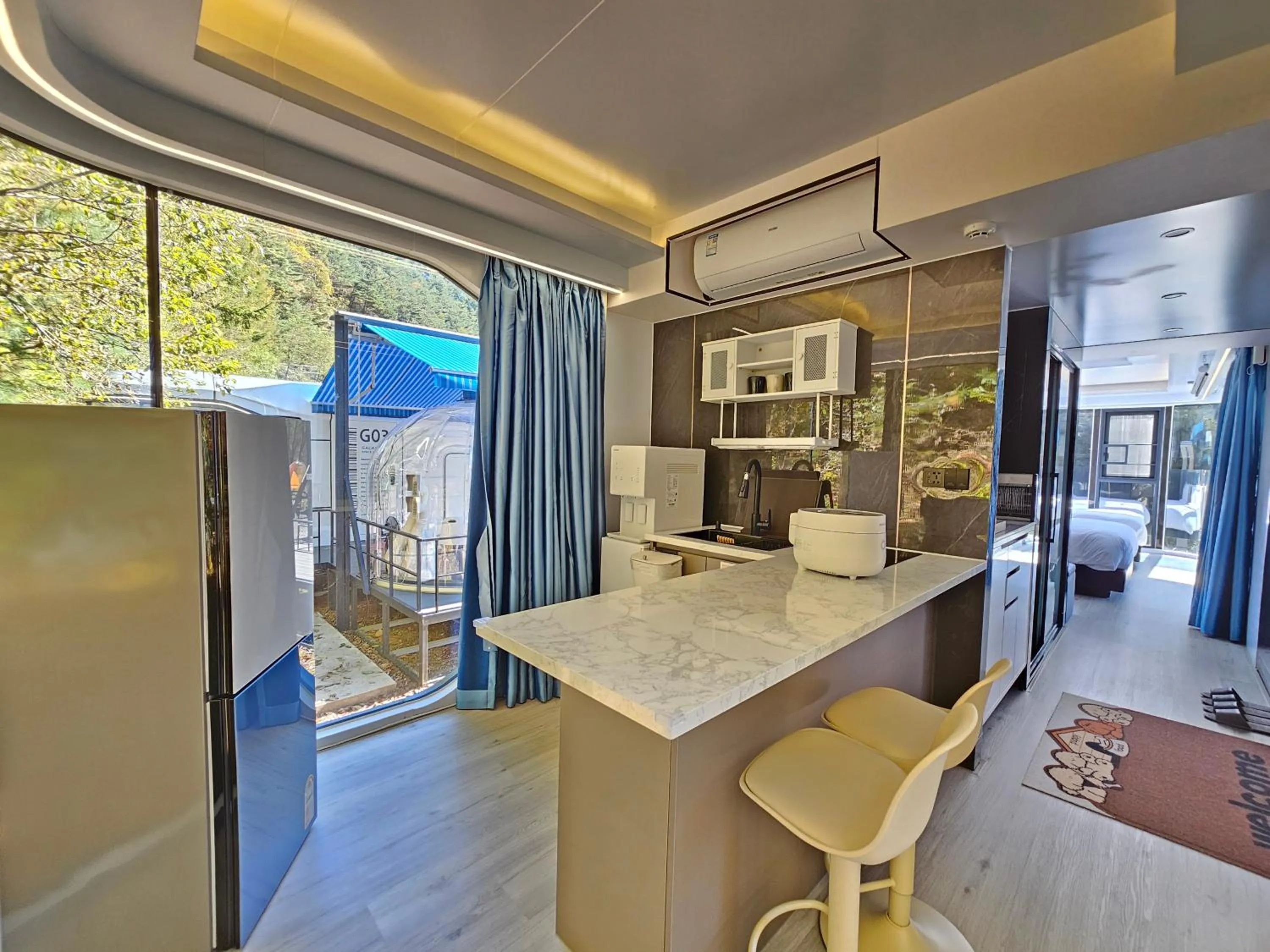 Kitchen or kitchenette in Galaxy X Hotel Type Caravan Glamping & Pension