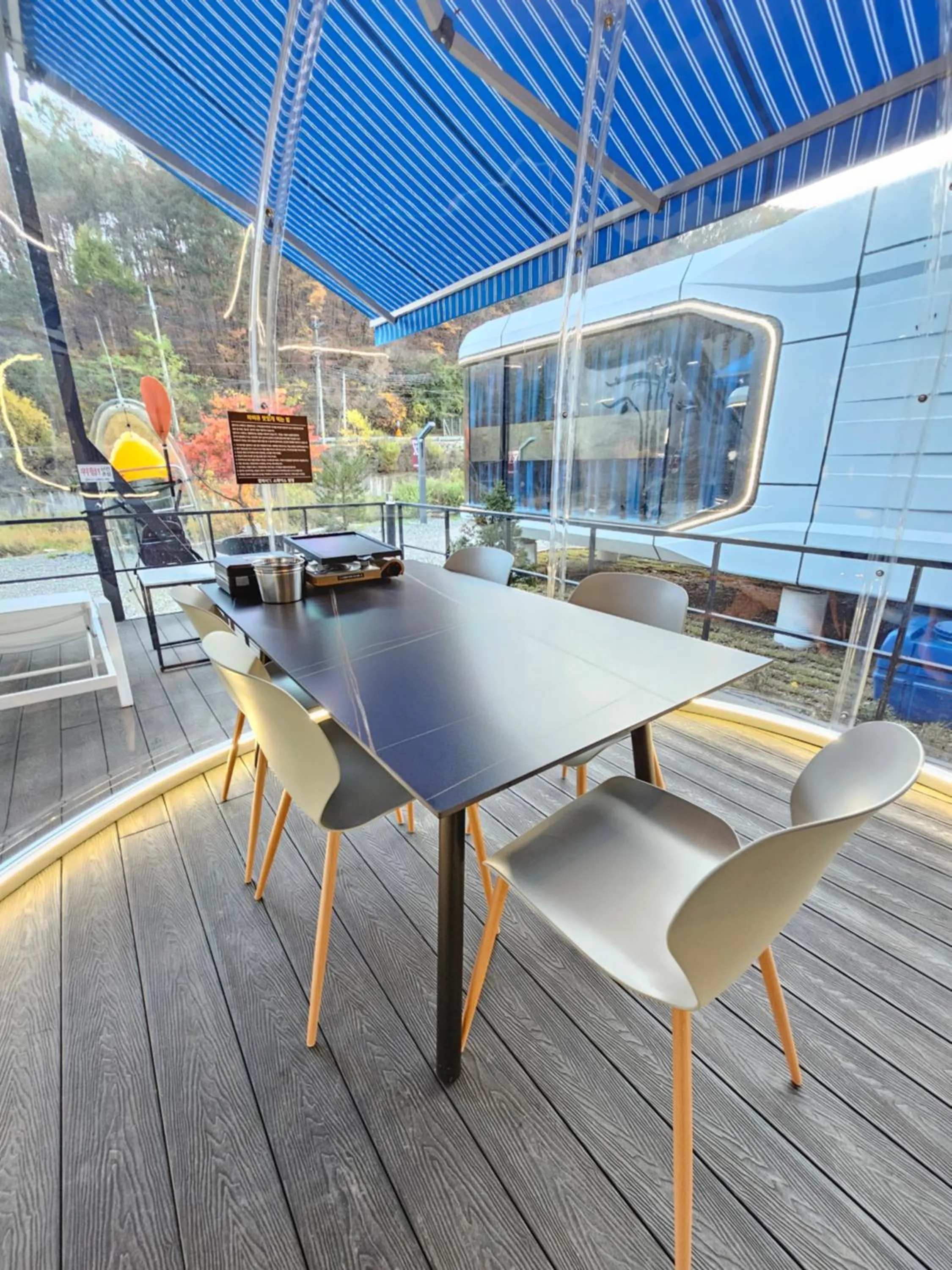 BBQ facilities in Galaxy X Hotel Type Caravan Glamping & Pension