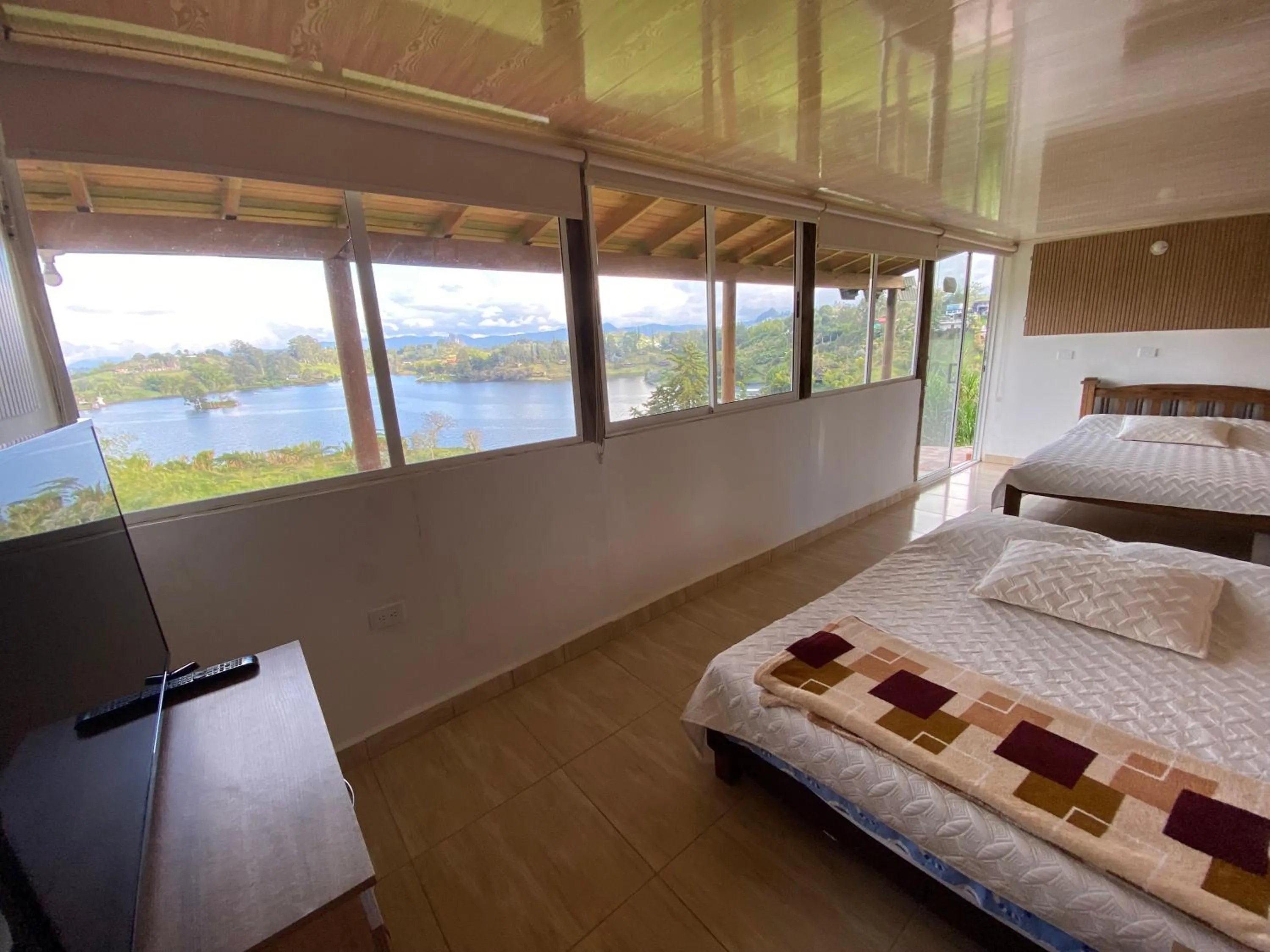 Bed in Loge Cabaña peñol-Guatape