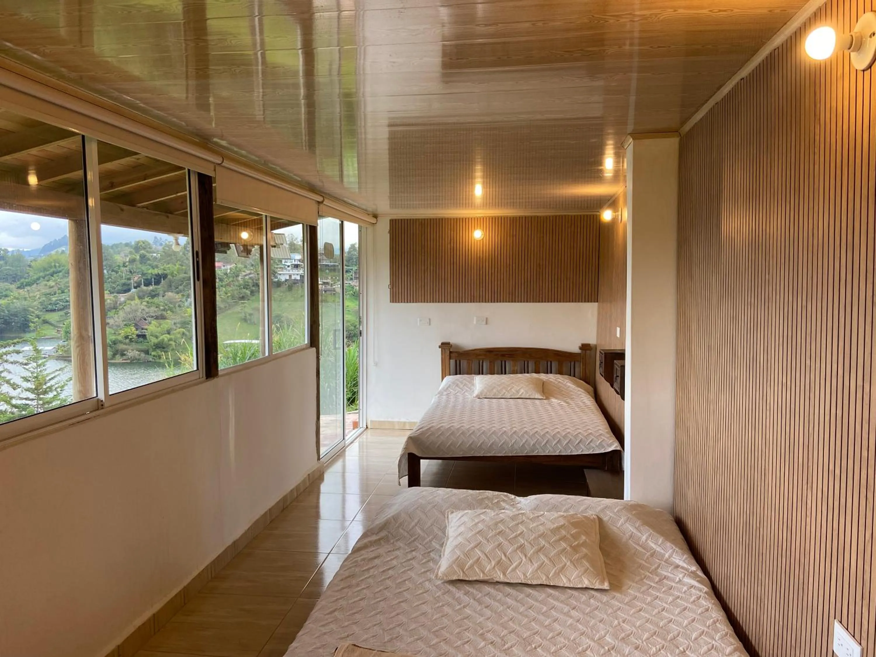 Bed in Loge Cabaña peñol-Guatape
