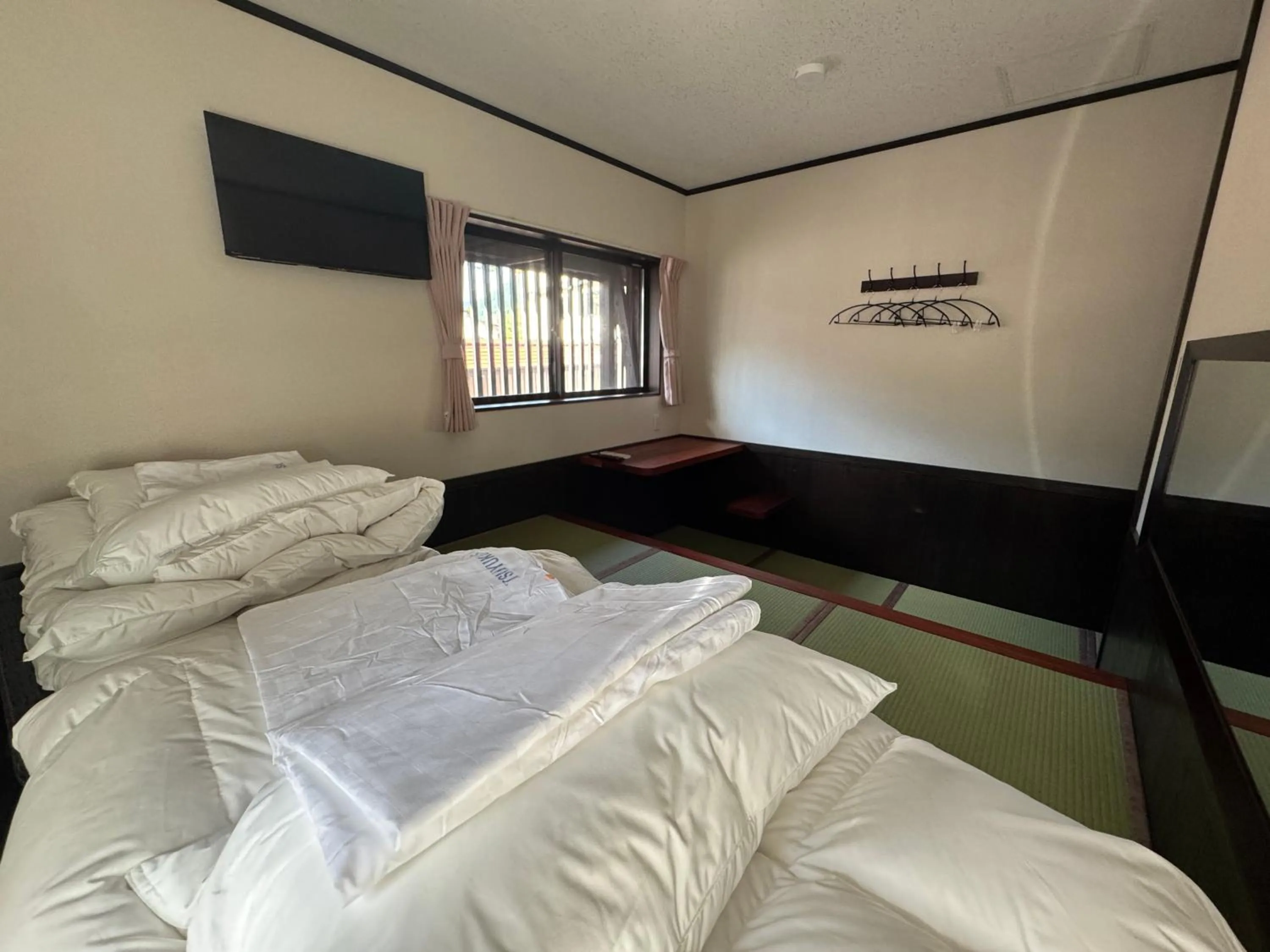 Bed in Tsuyukusa