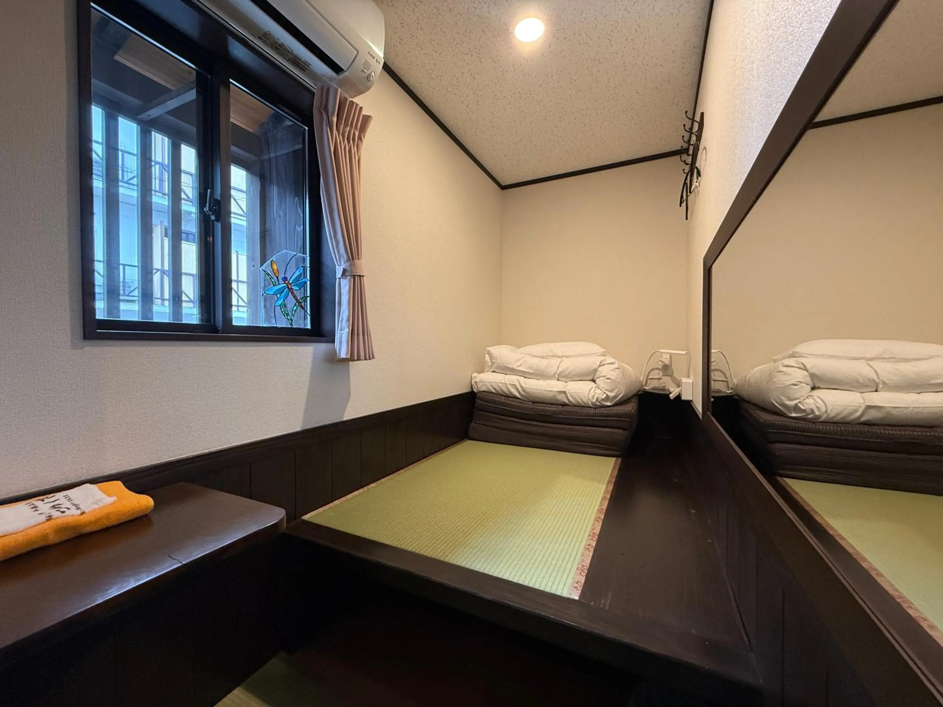 Bed in Tsuyukusa