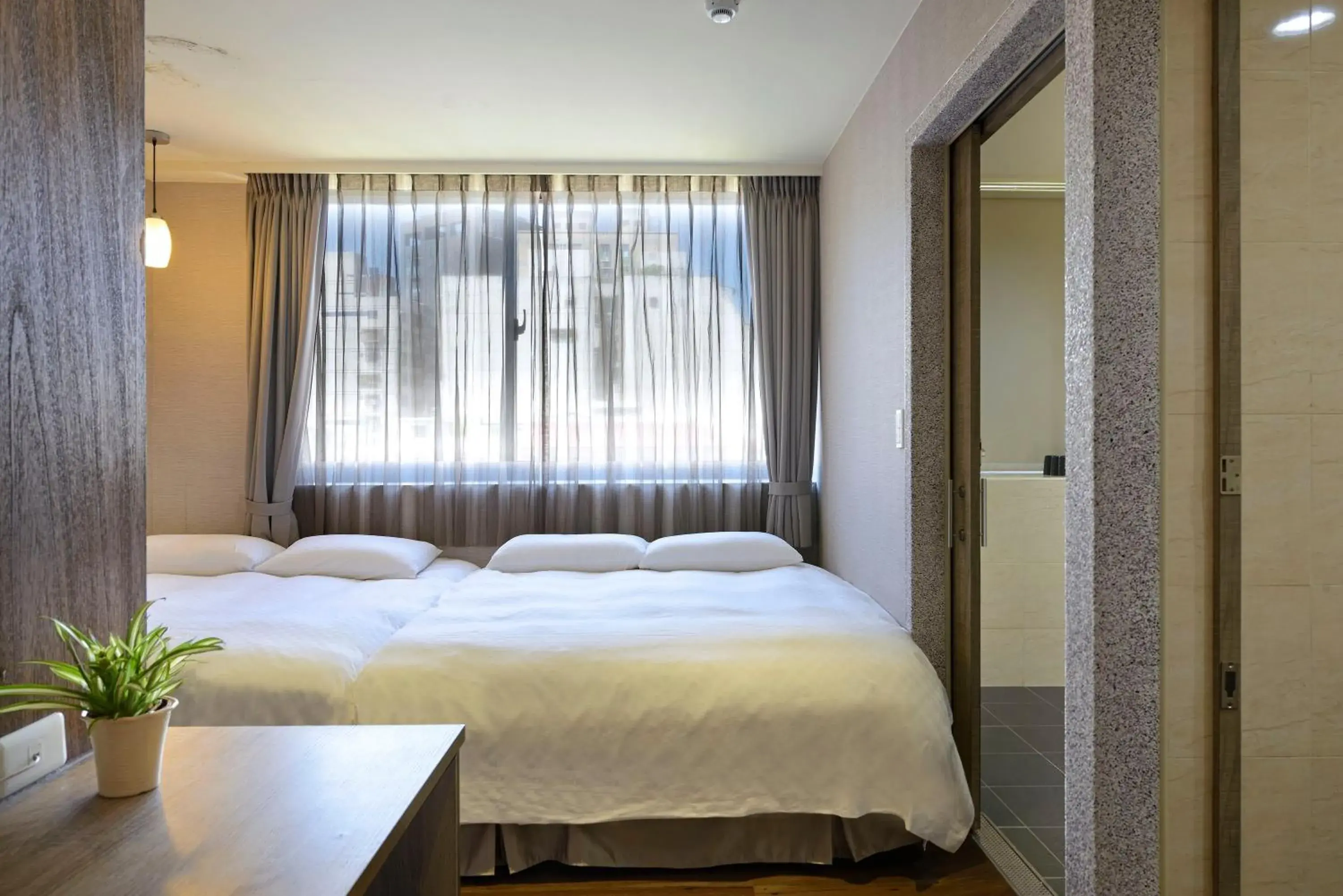 Bed in 綺樂文旅 康定館 Le Room Hotel Kangding Bed in 綺樂文旅 康定館 Le Room Hotel Kangding