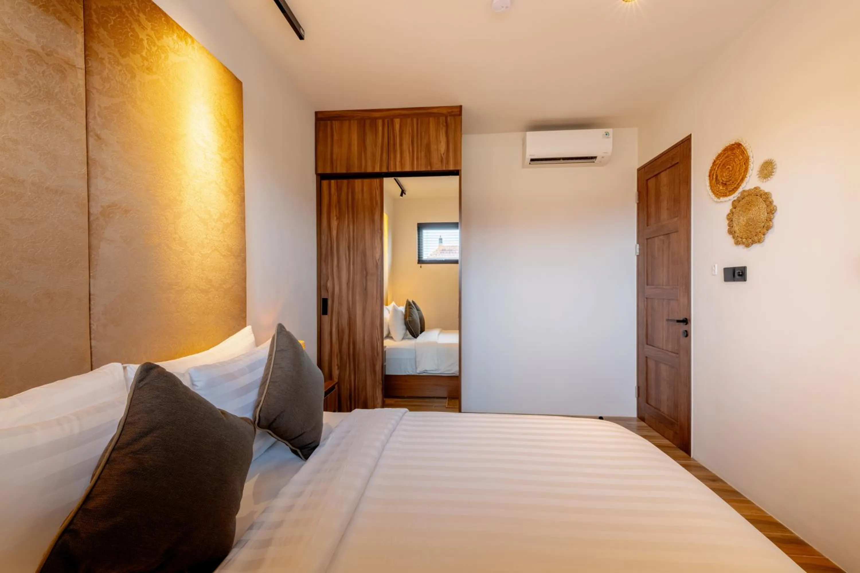 Bed in Avanya Luxury Apartment