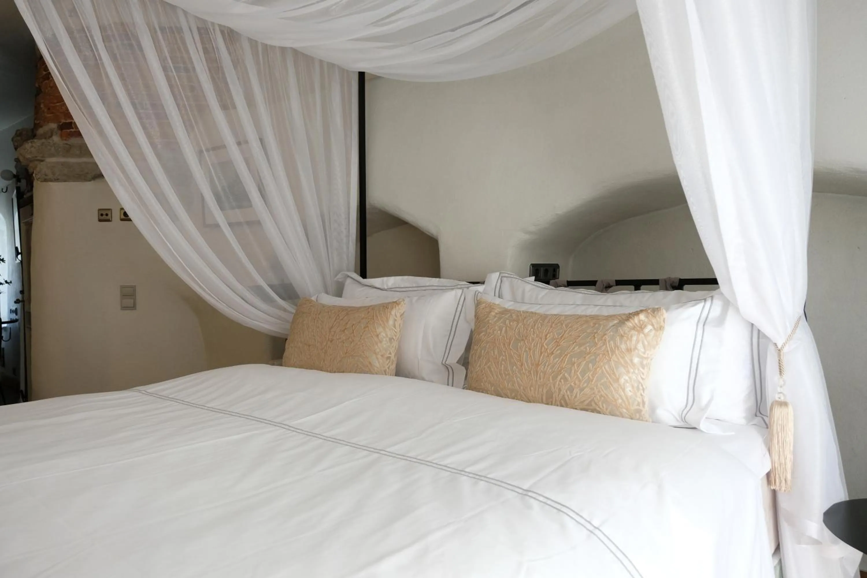 Bed in The Three Sisters Hotel