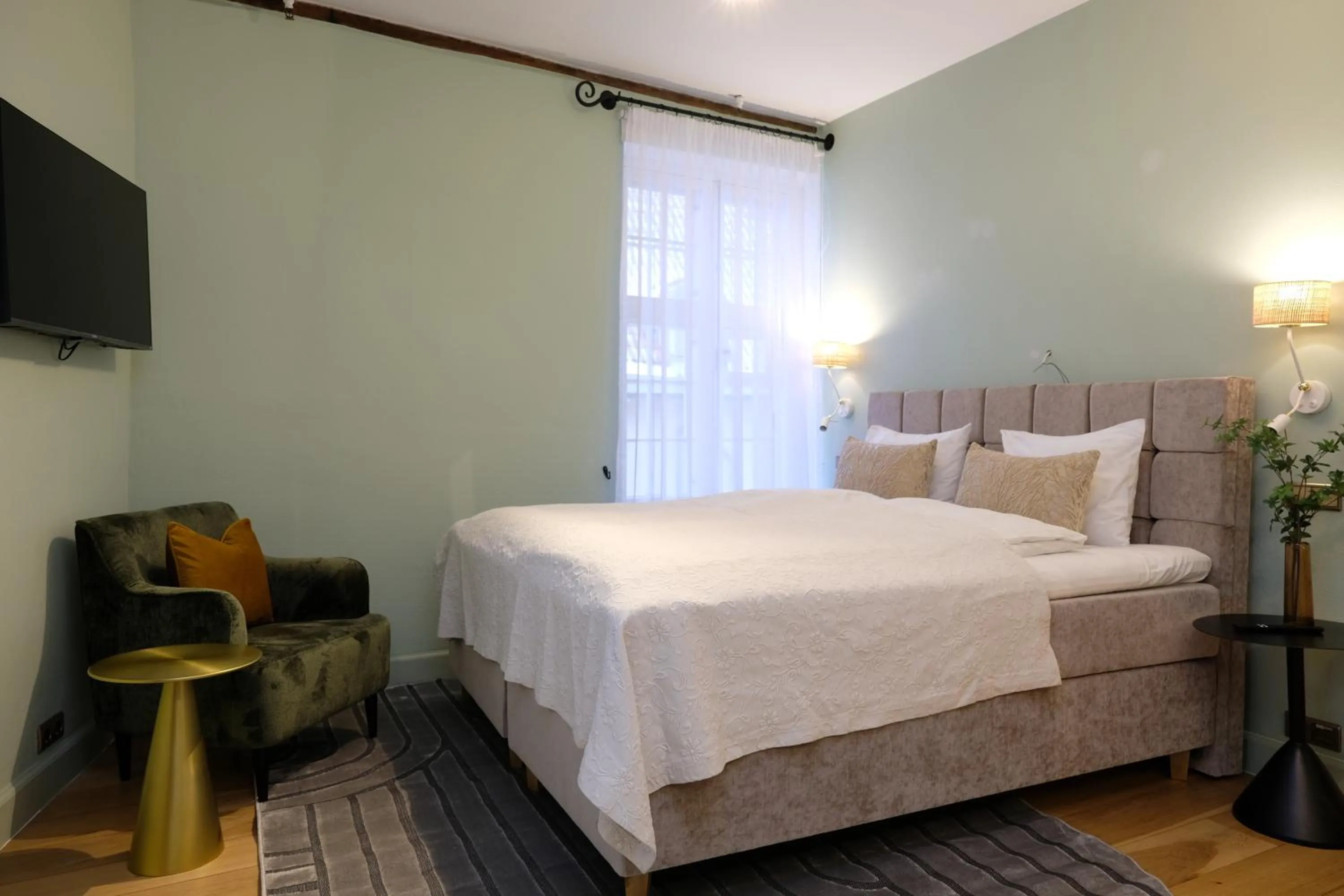 Bed in The Three Sisters Hotel