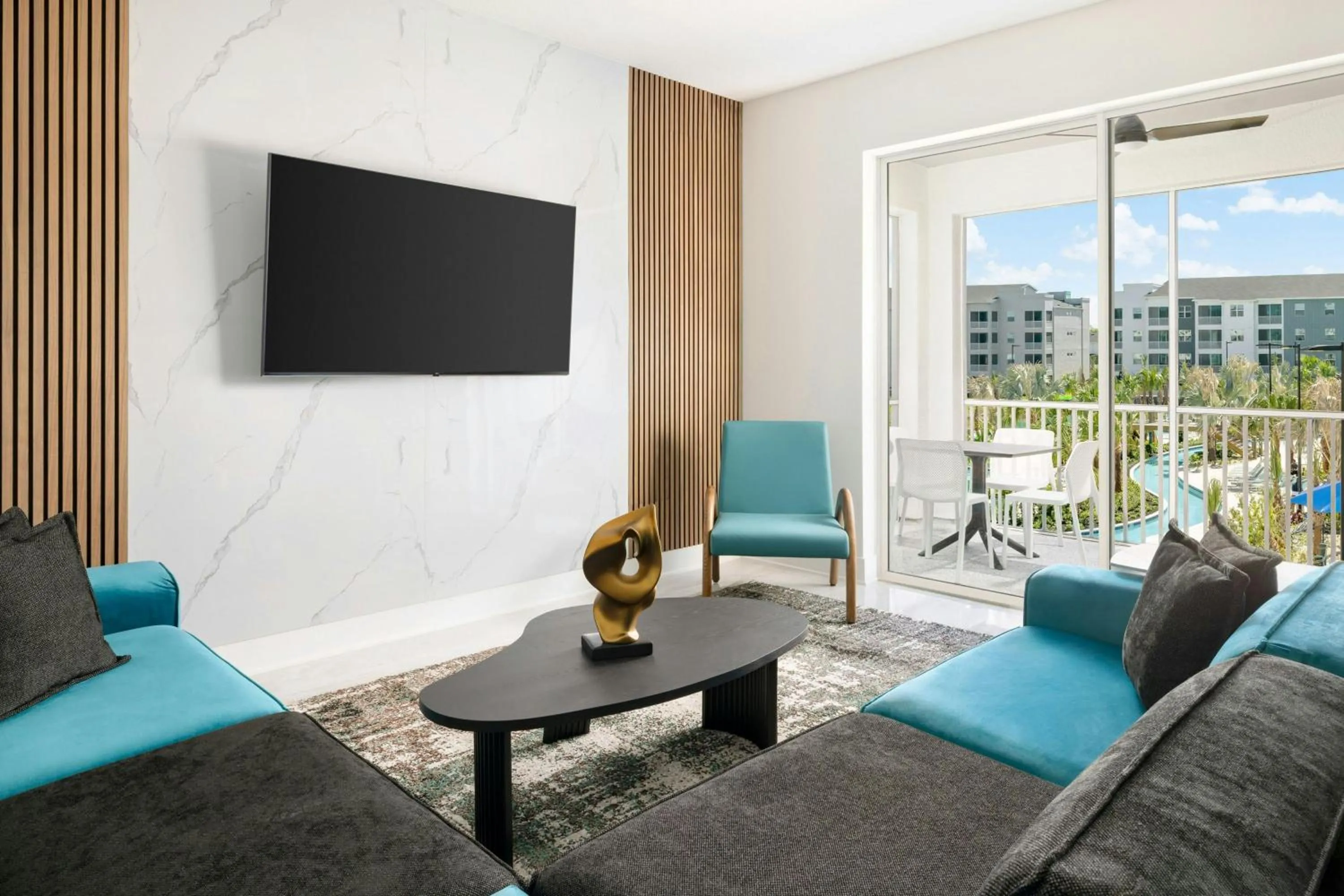 Living room in Villatel Orlando Resort, Apartments by Marriott Bonvoy