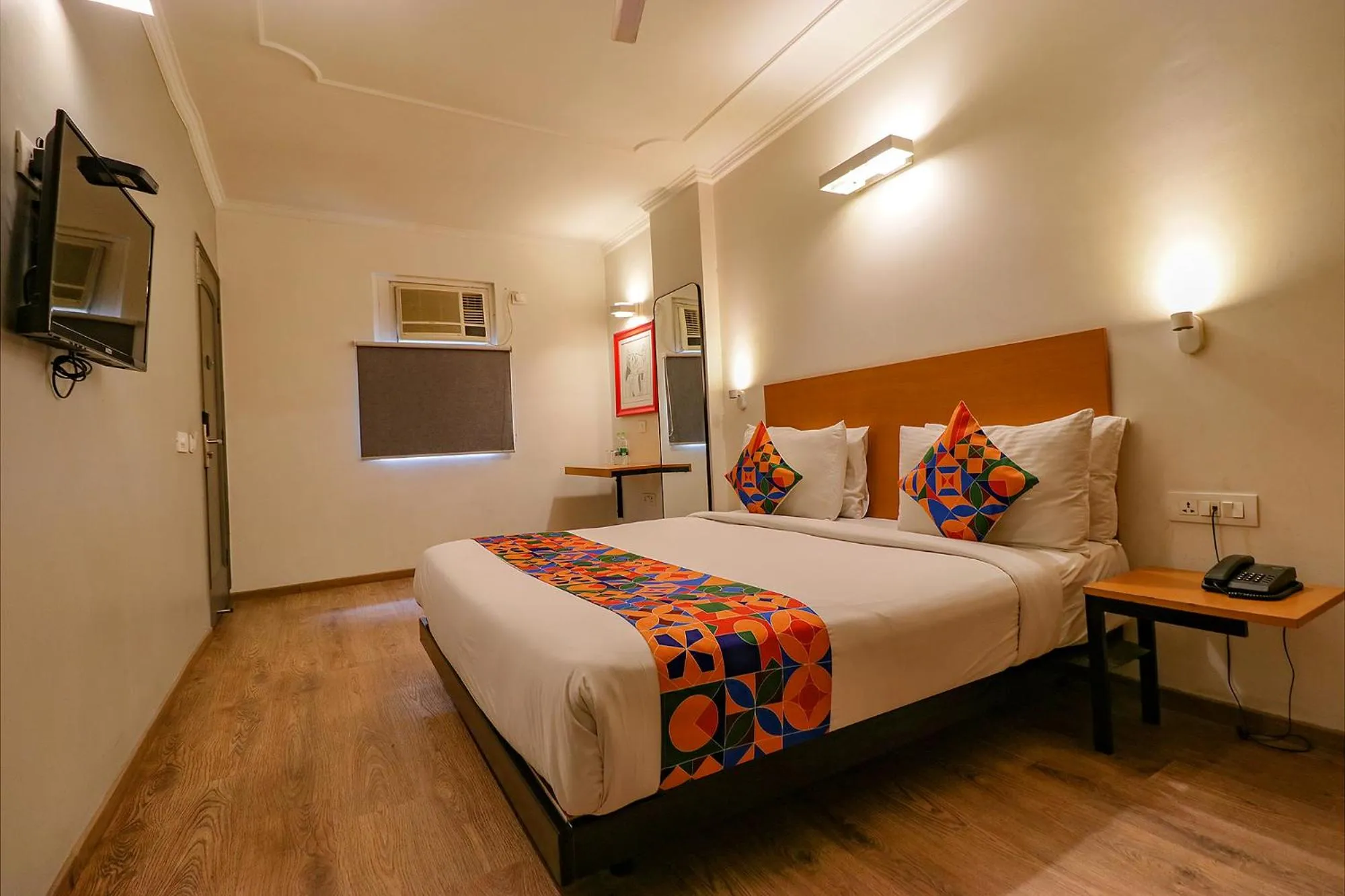 Bed in FabHotel Lord Inn