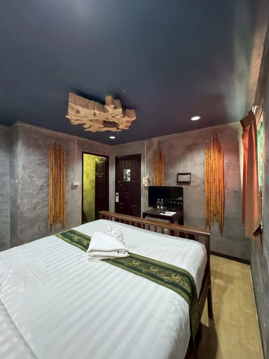 Bed in Lanna Boutique Resort Chiang Mai