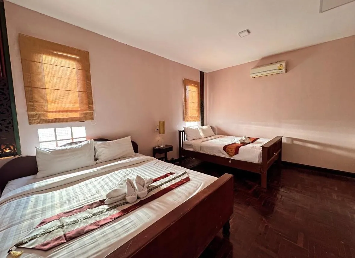 Bed in Lanna Boutique Resort Chiang Mai