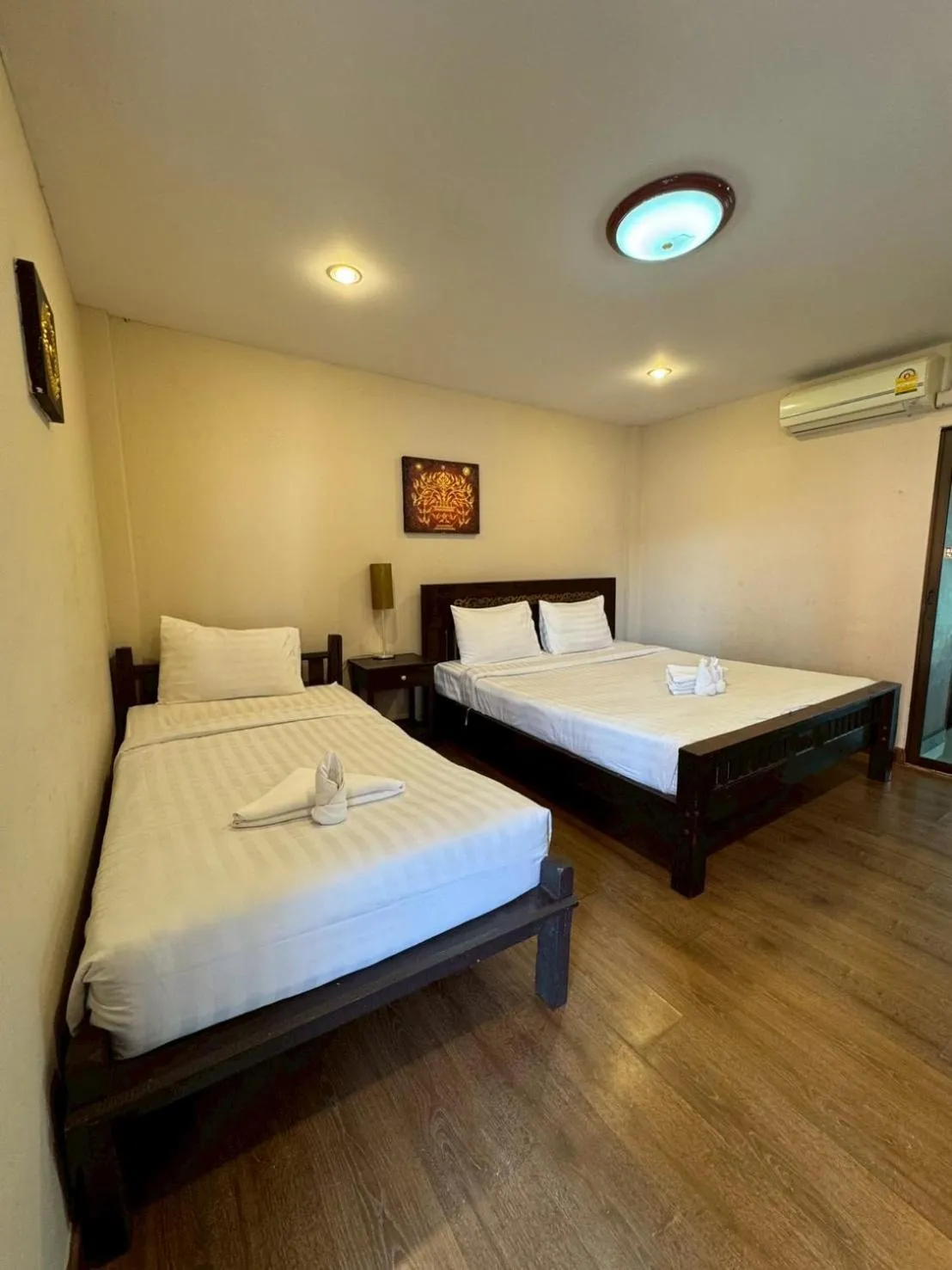 Bed in Lanna Boutique Resort Chiang Mai