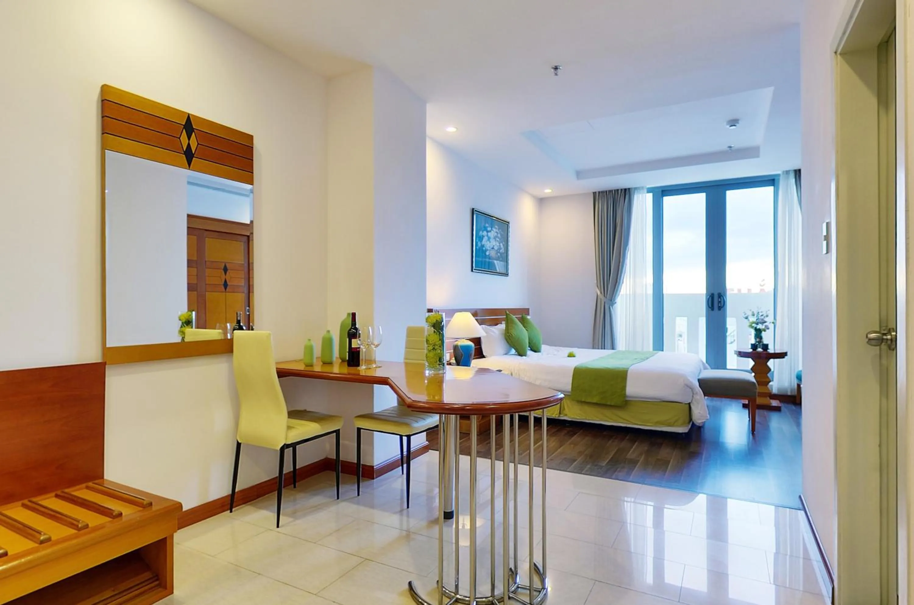 Bed in Richico Apartments And Hotel