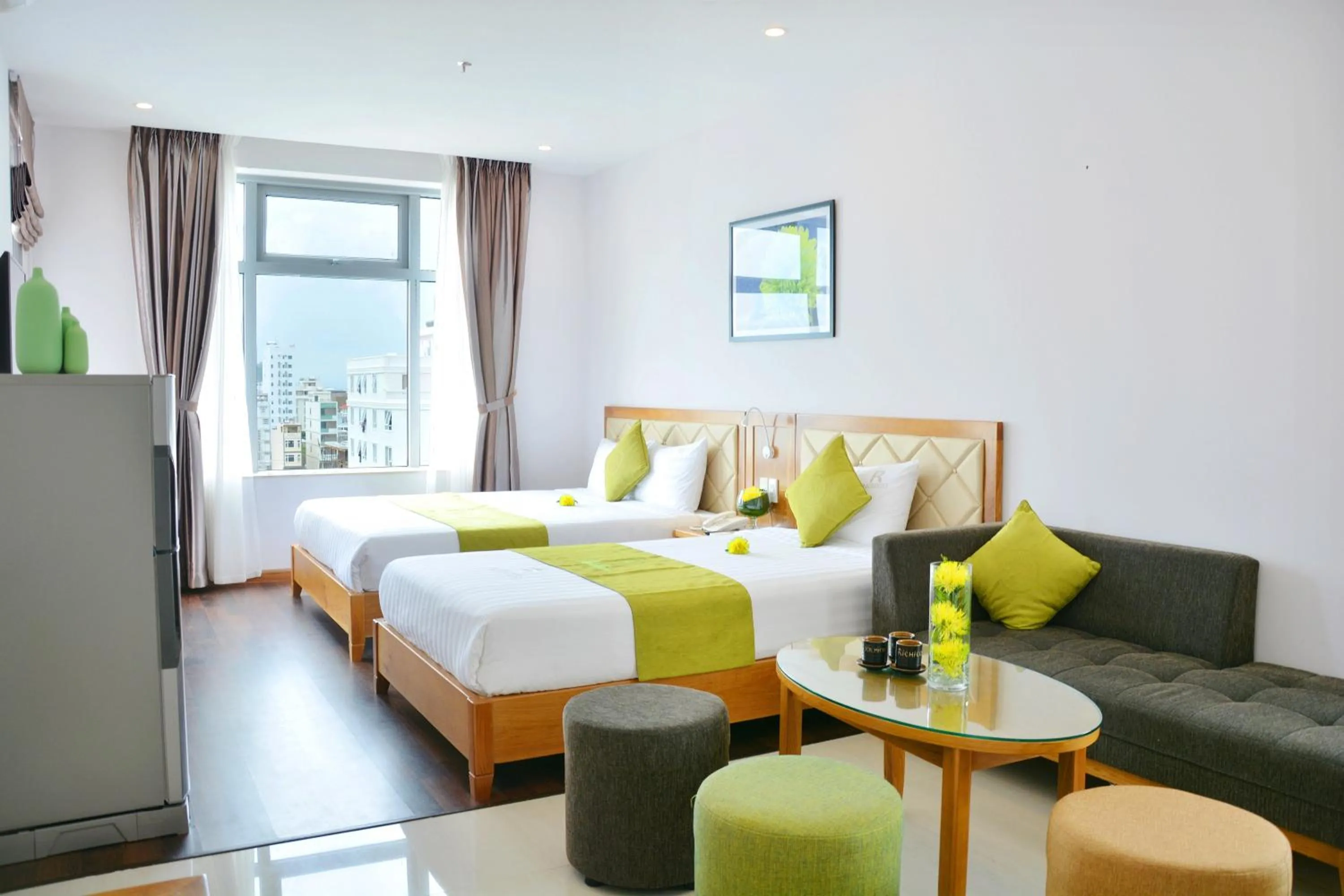 Bed in Richico Apartments And Hotel