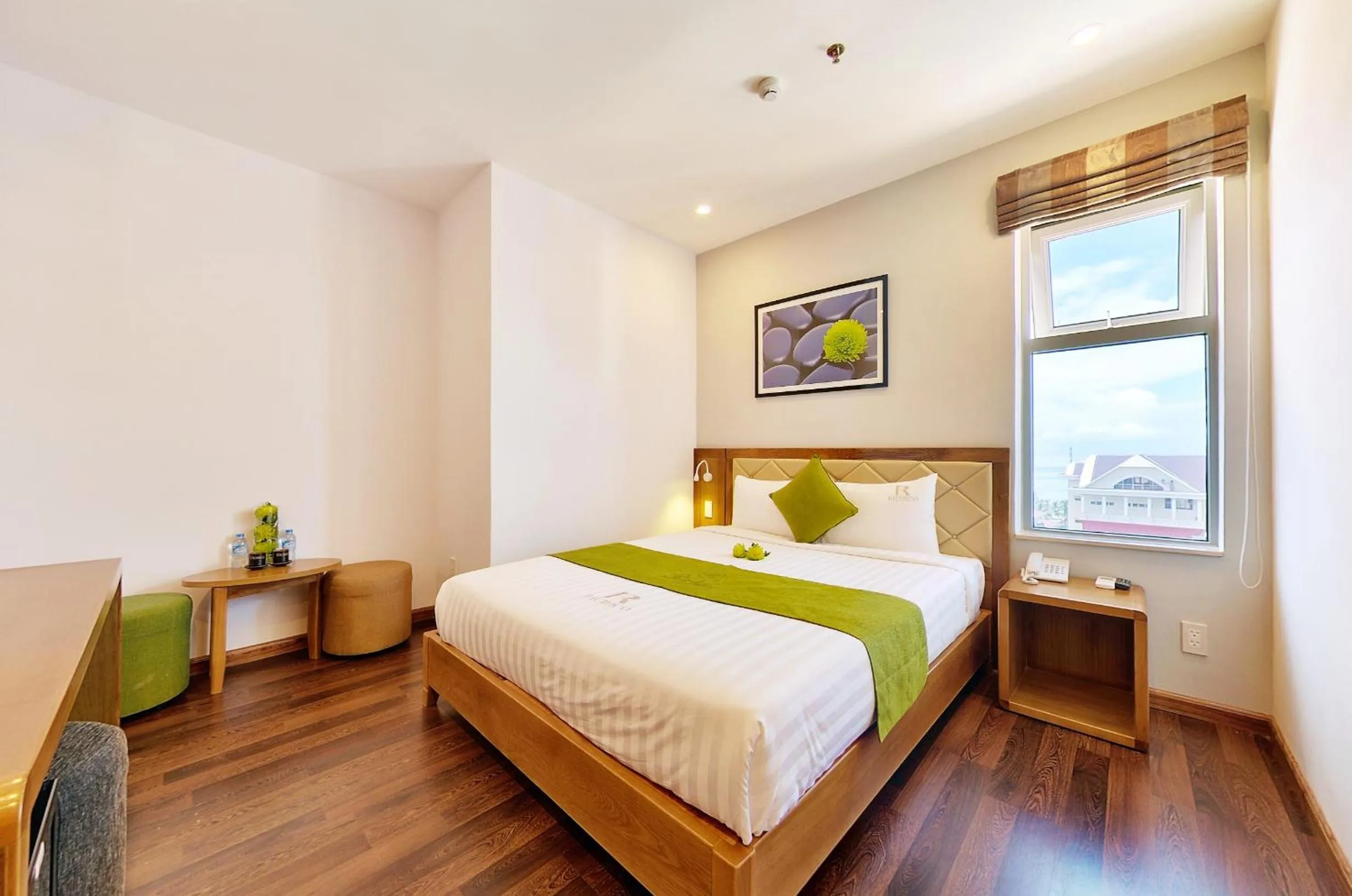 Bed in Richico Apartments And Hotel