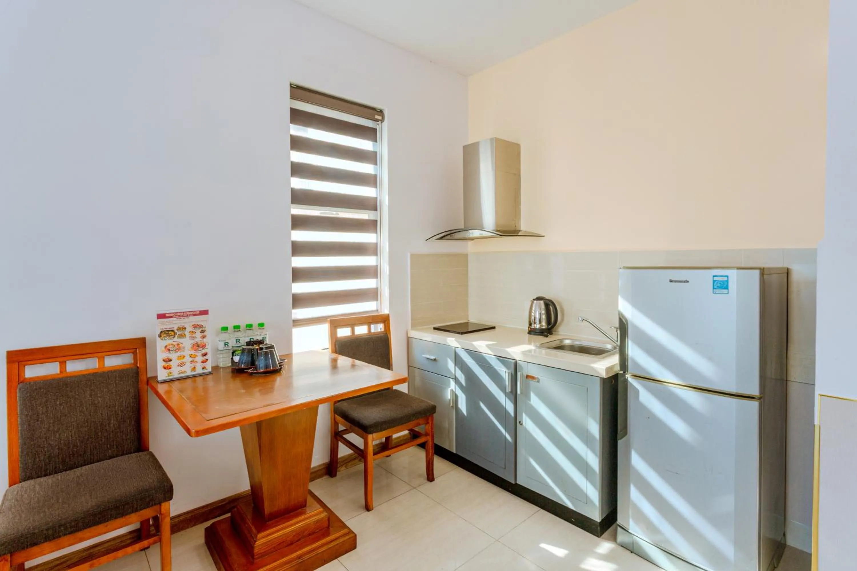 Kitchen or kitchenette in Richico Apartments And Hotel