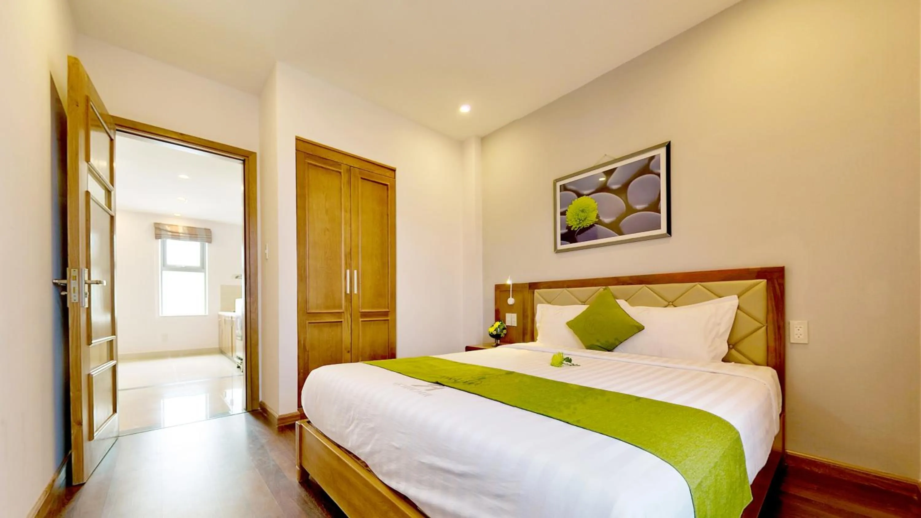 Bed in Richico Apartments And Hotel