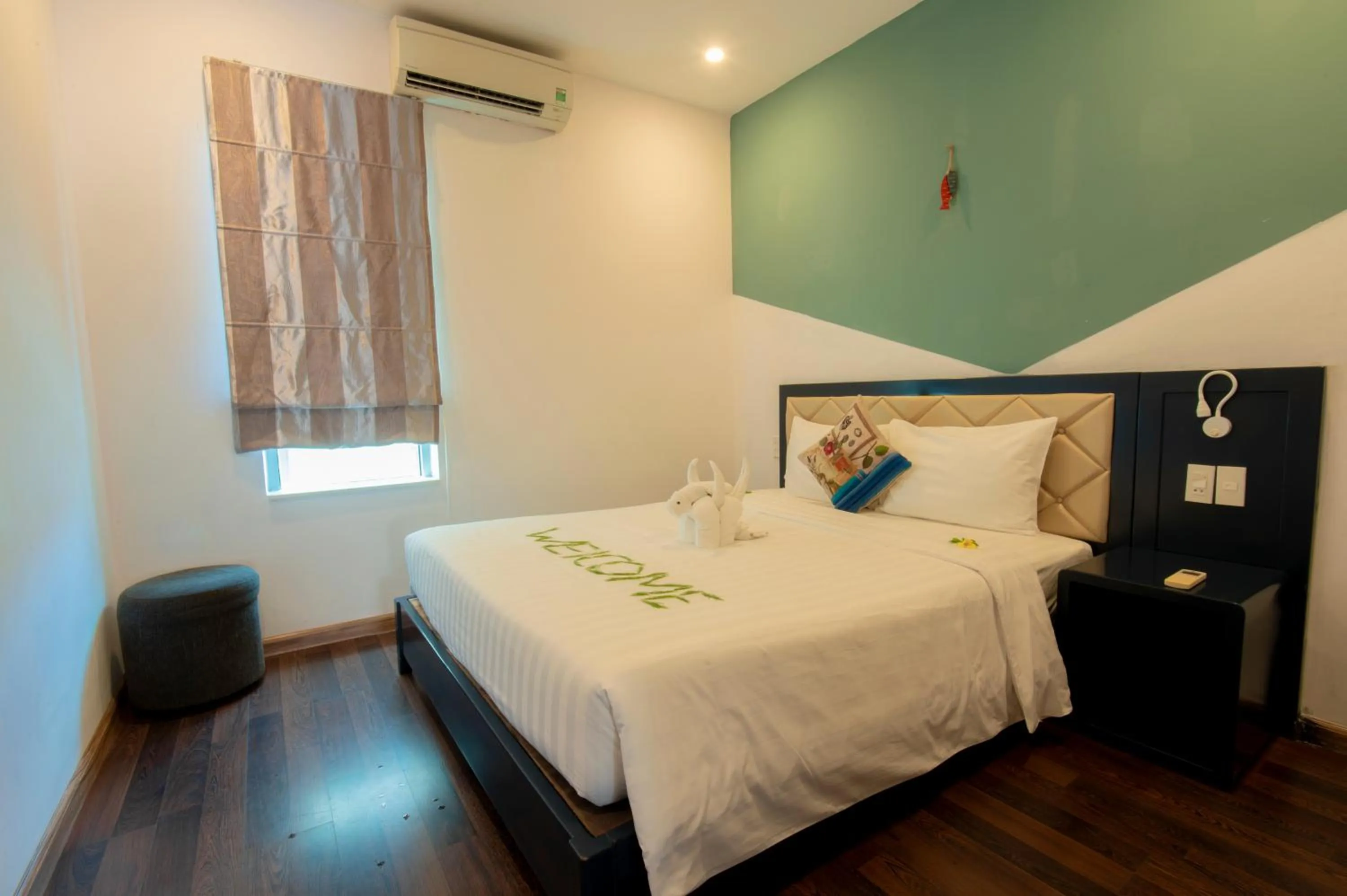 Bed in Richico Apartments And Hotel
