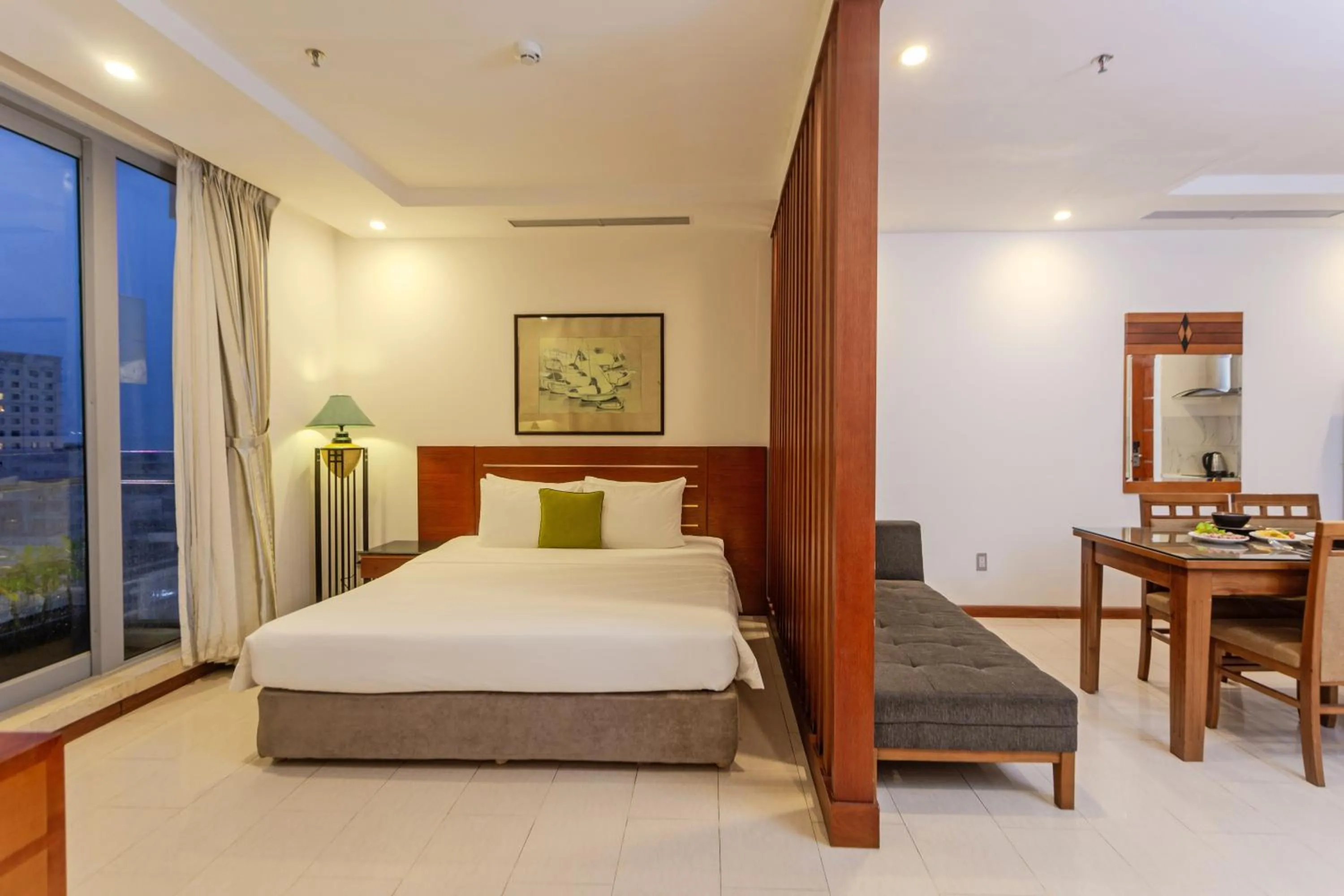 Bed in Richico Apartments And Hotel