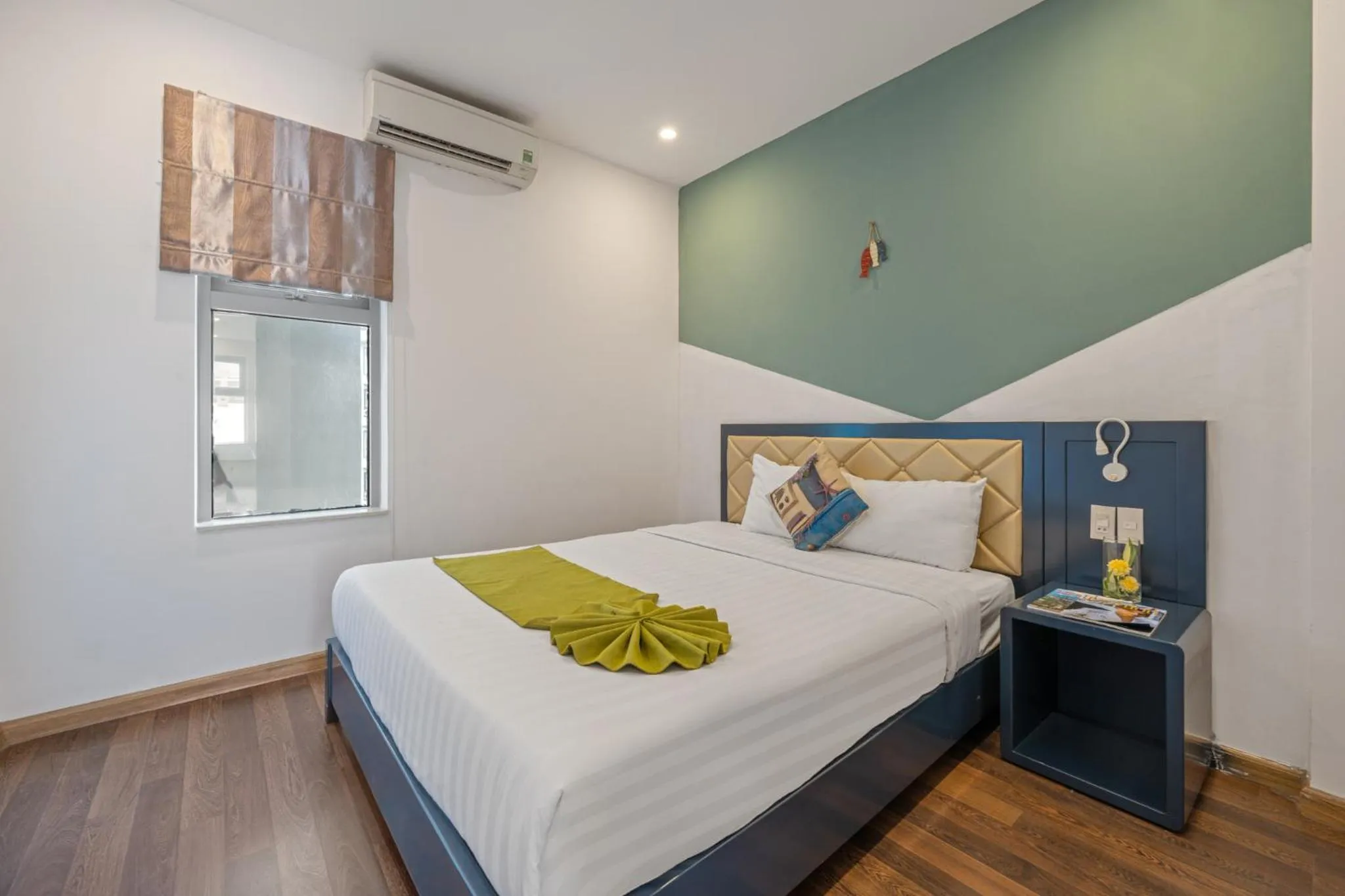 Bed in Richico Apartments And Hotel