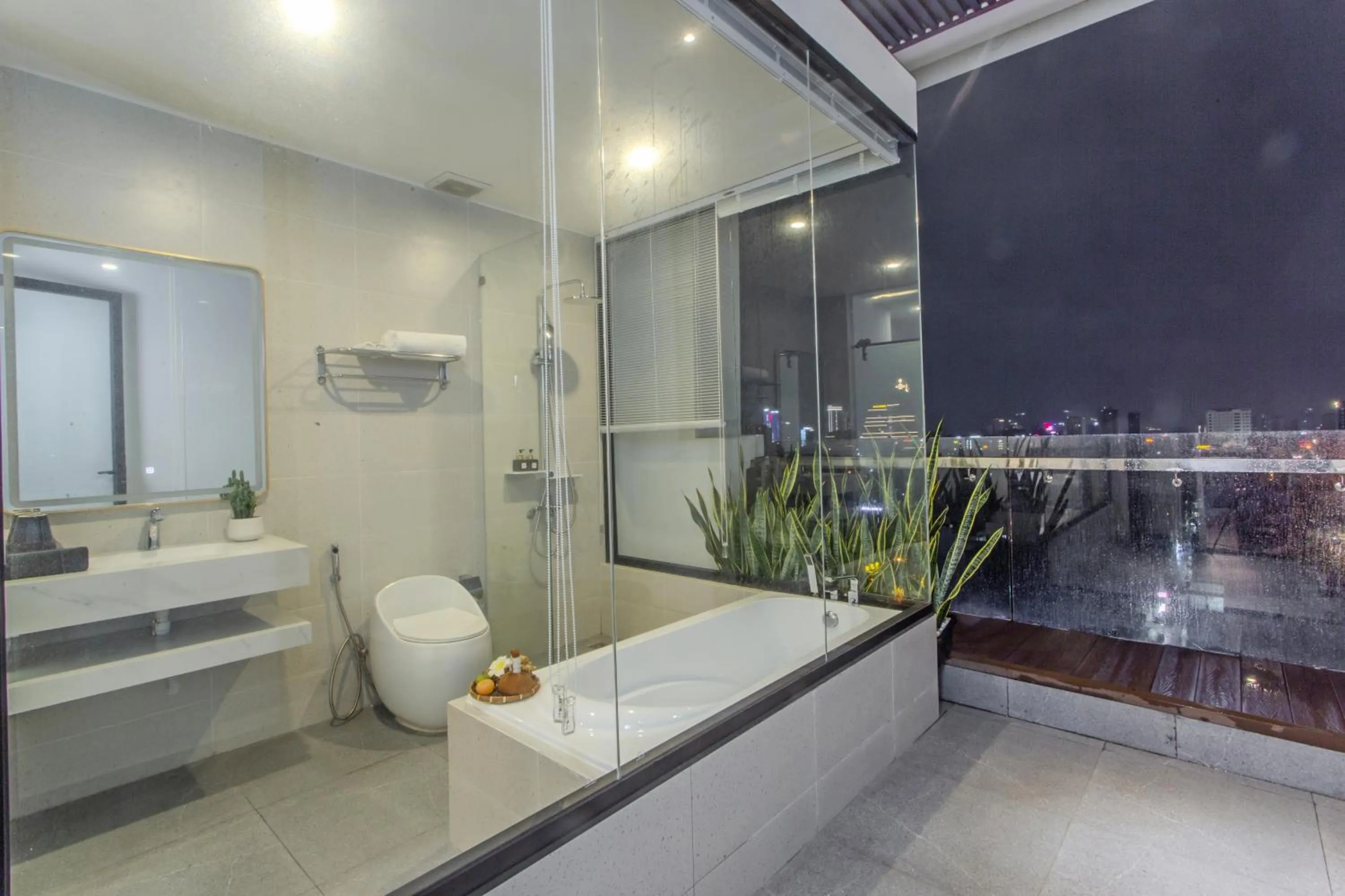 Shower in Richico Apartments And Hotel