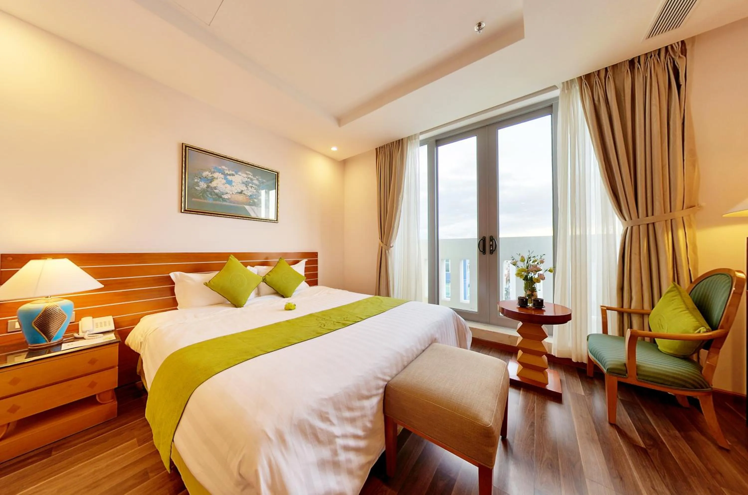 Bed in Richico Apartments And Hotel