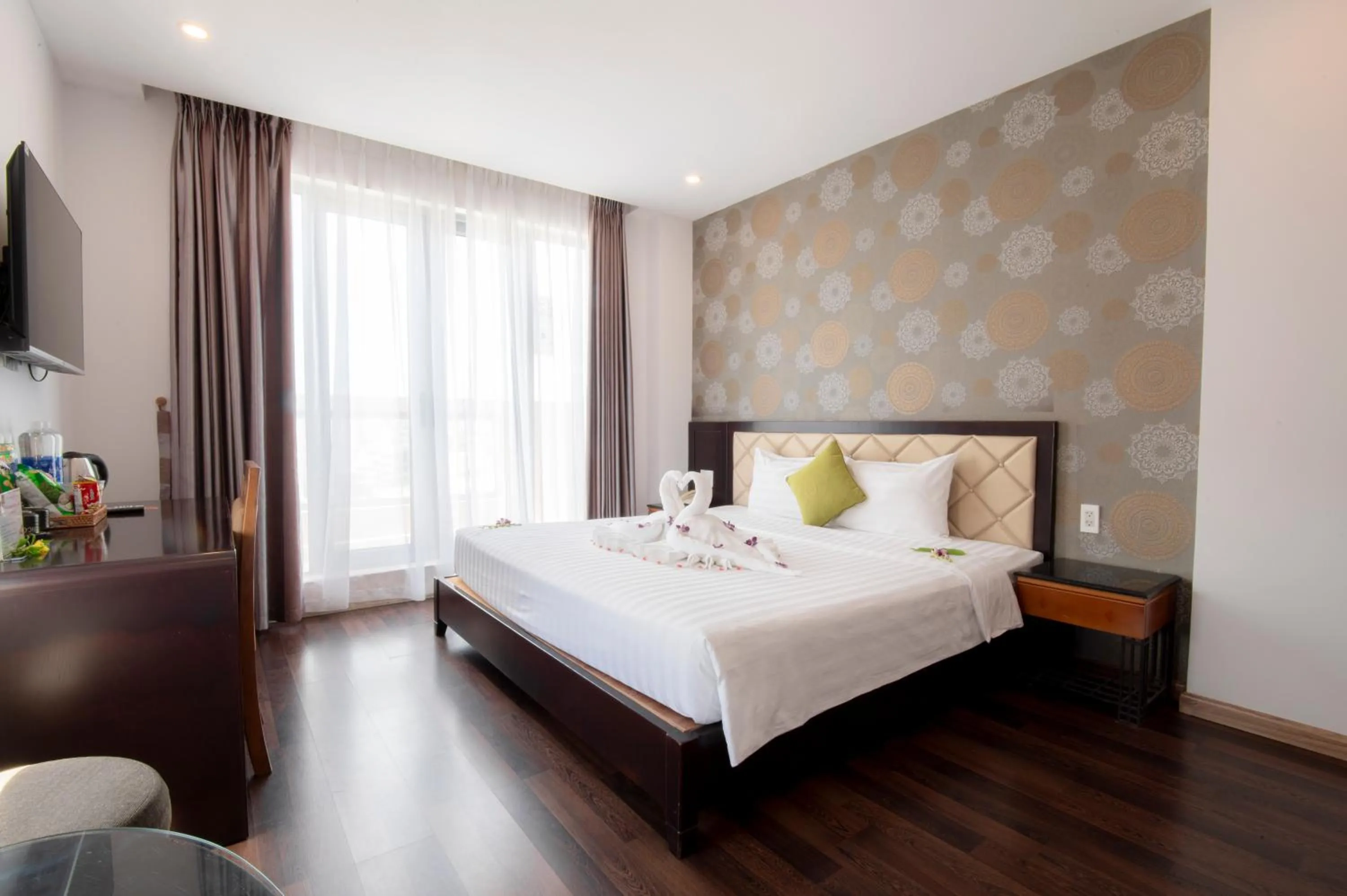 Bed in Richico Apartments And Hotel