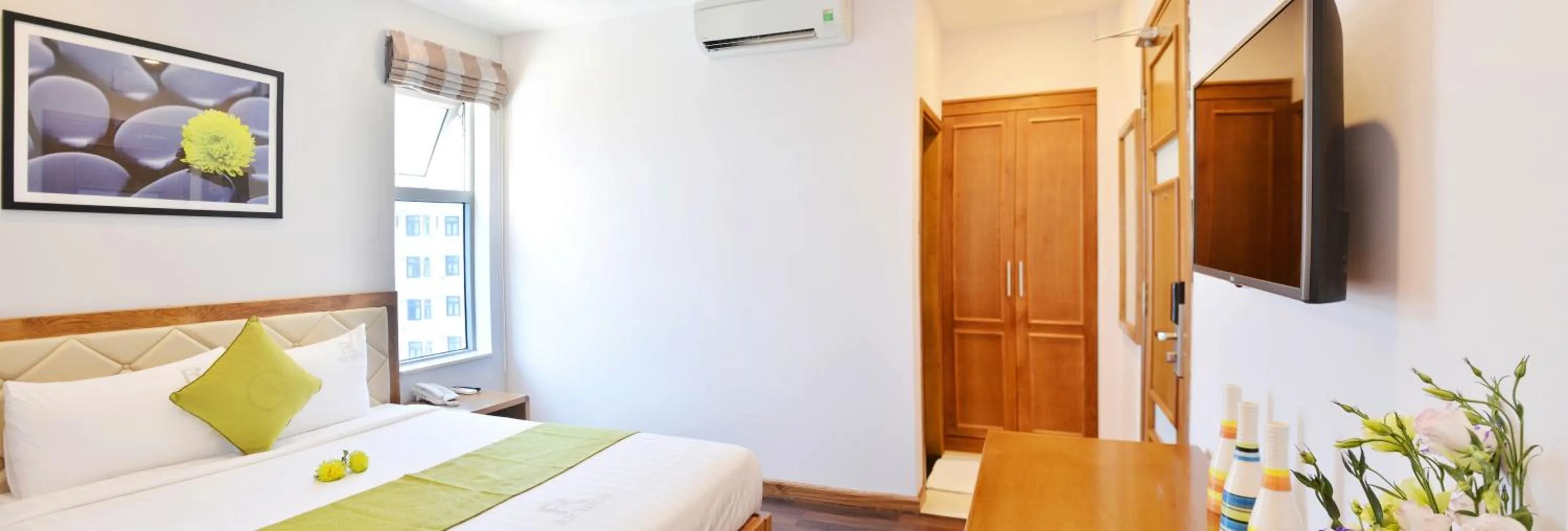 Bed in Richico Apartments And Hotel