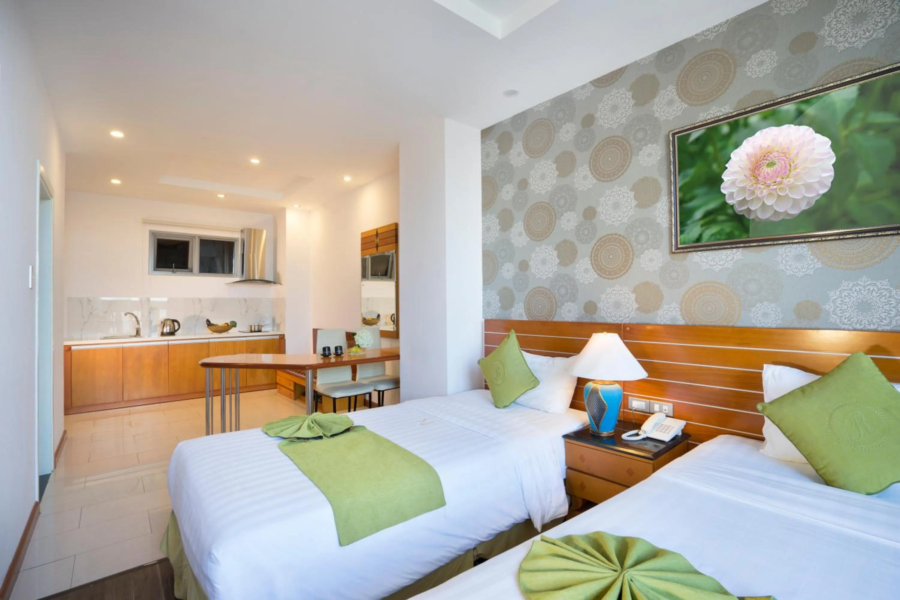 Bed in Richico Apartments And Hotel