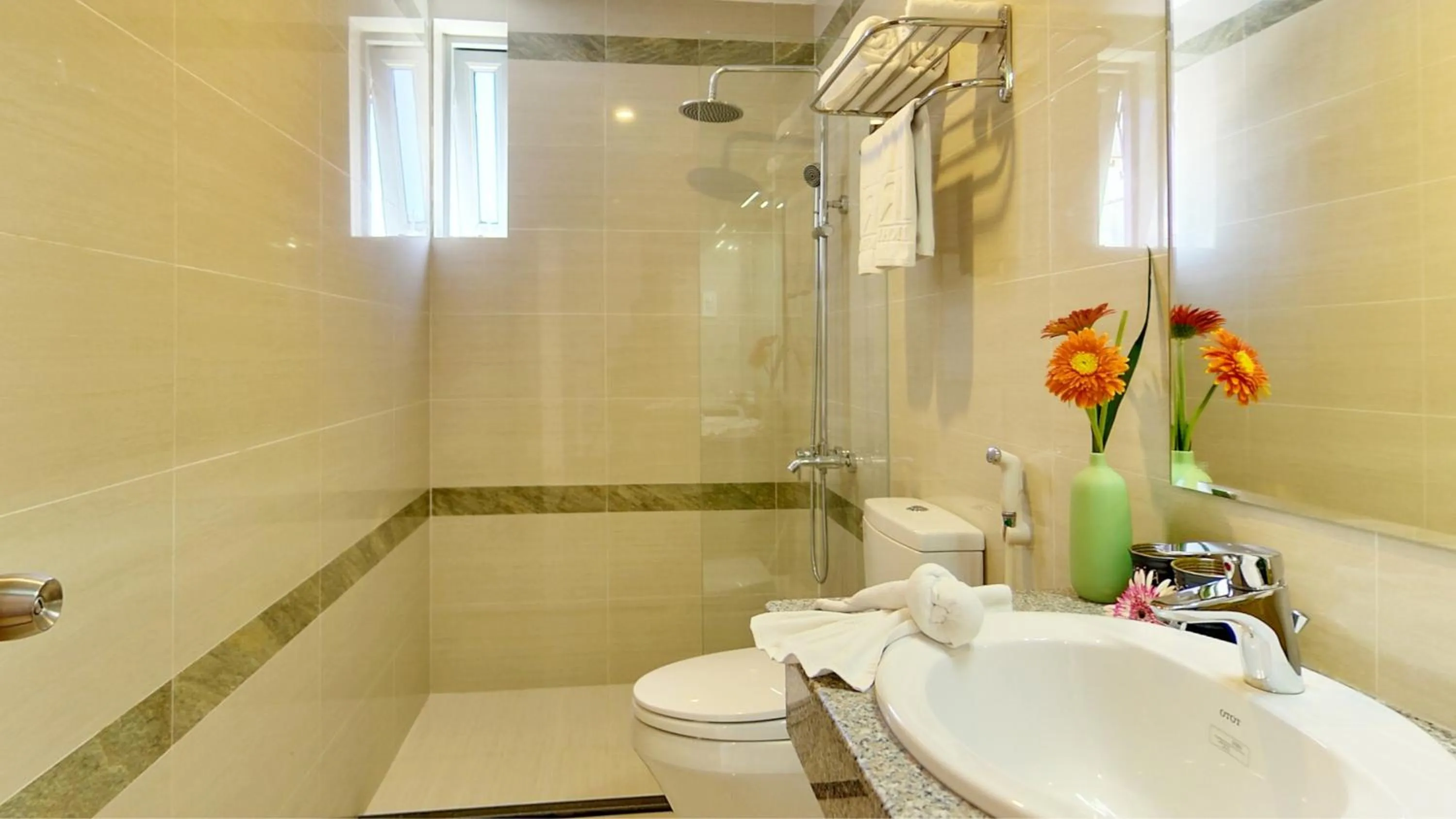 Toilet in Richico Apartments And Hotel