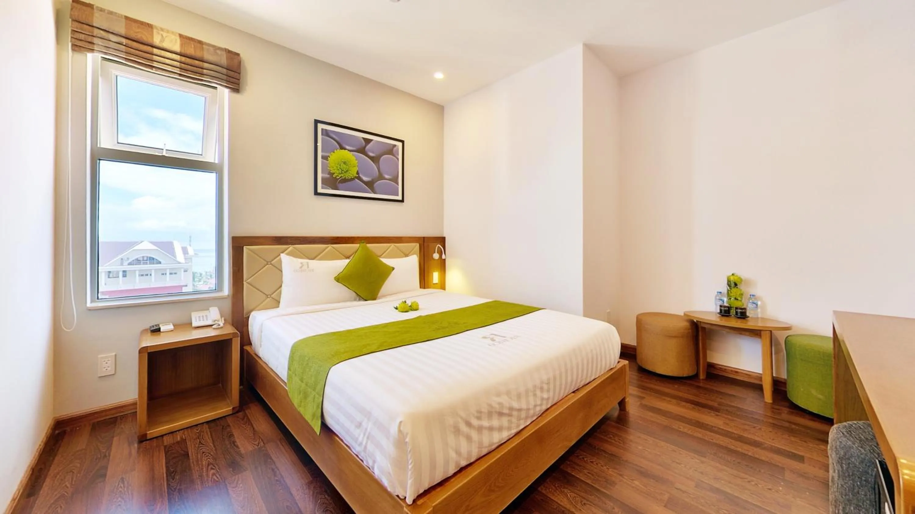 Bed in Richico Apartments And Hotel