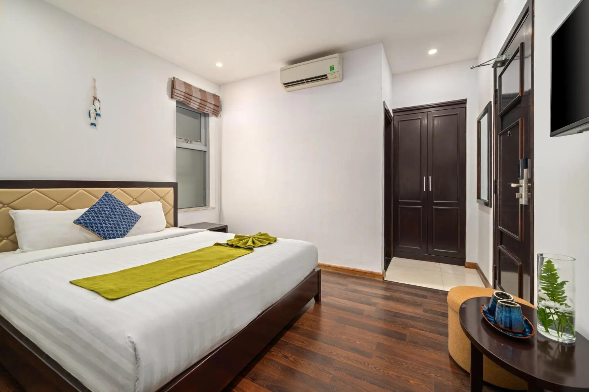 Bed in Richico Apartments And Hotel