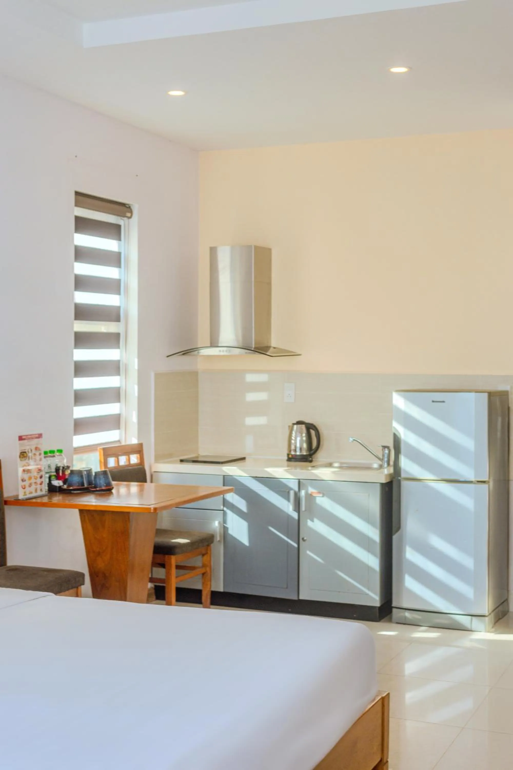 Kitchen or kitchenette in Richico Apartments And Hotel