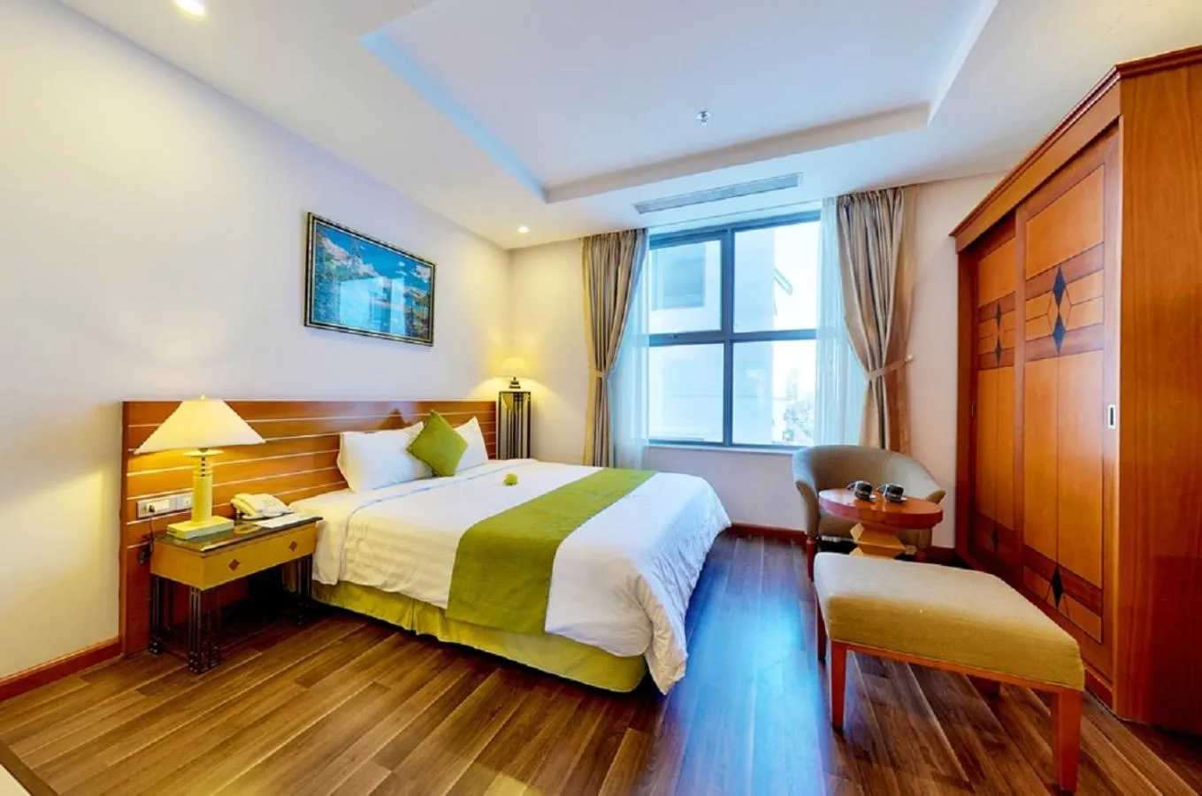 Bed in Richico Apartments And Hotel