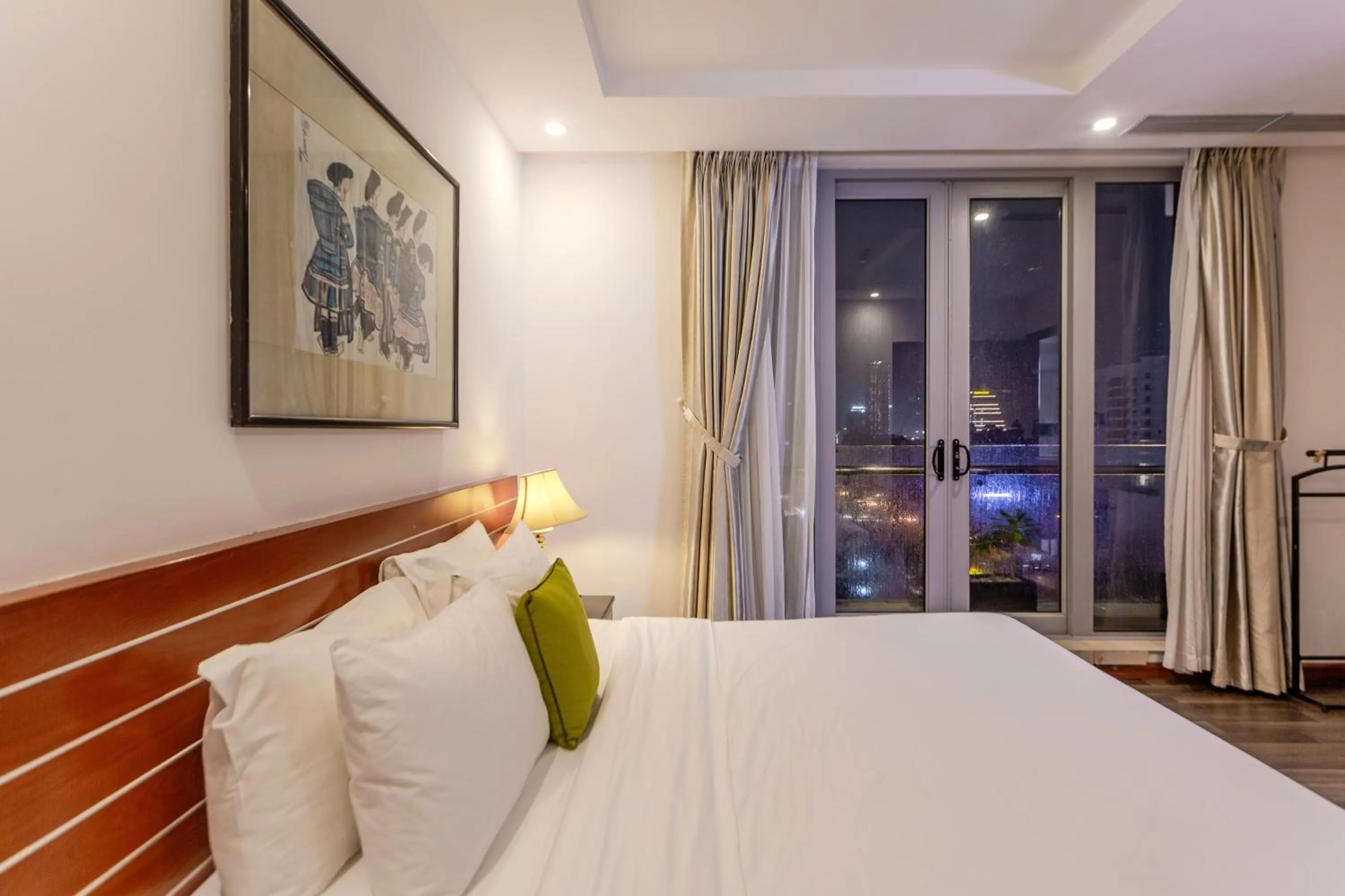 Bed in Richico Apartments And Hotel