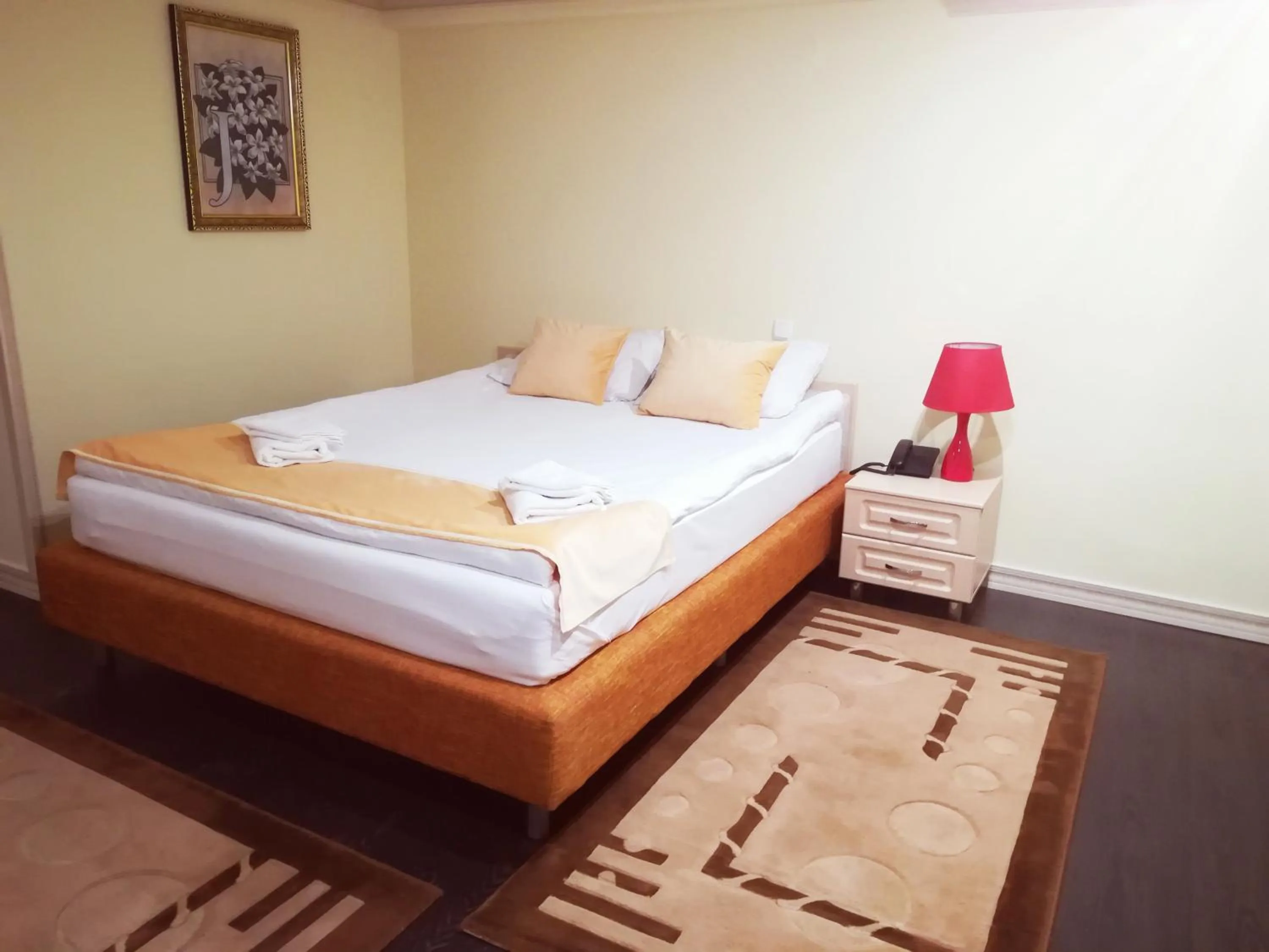 Bed in Jasmine Hotel