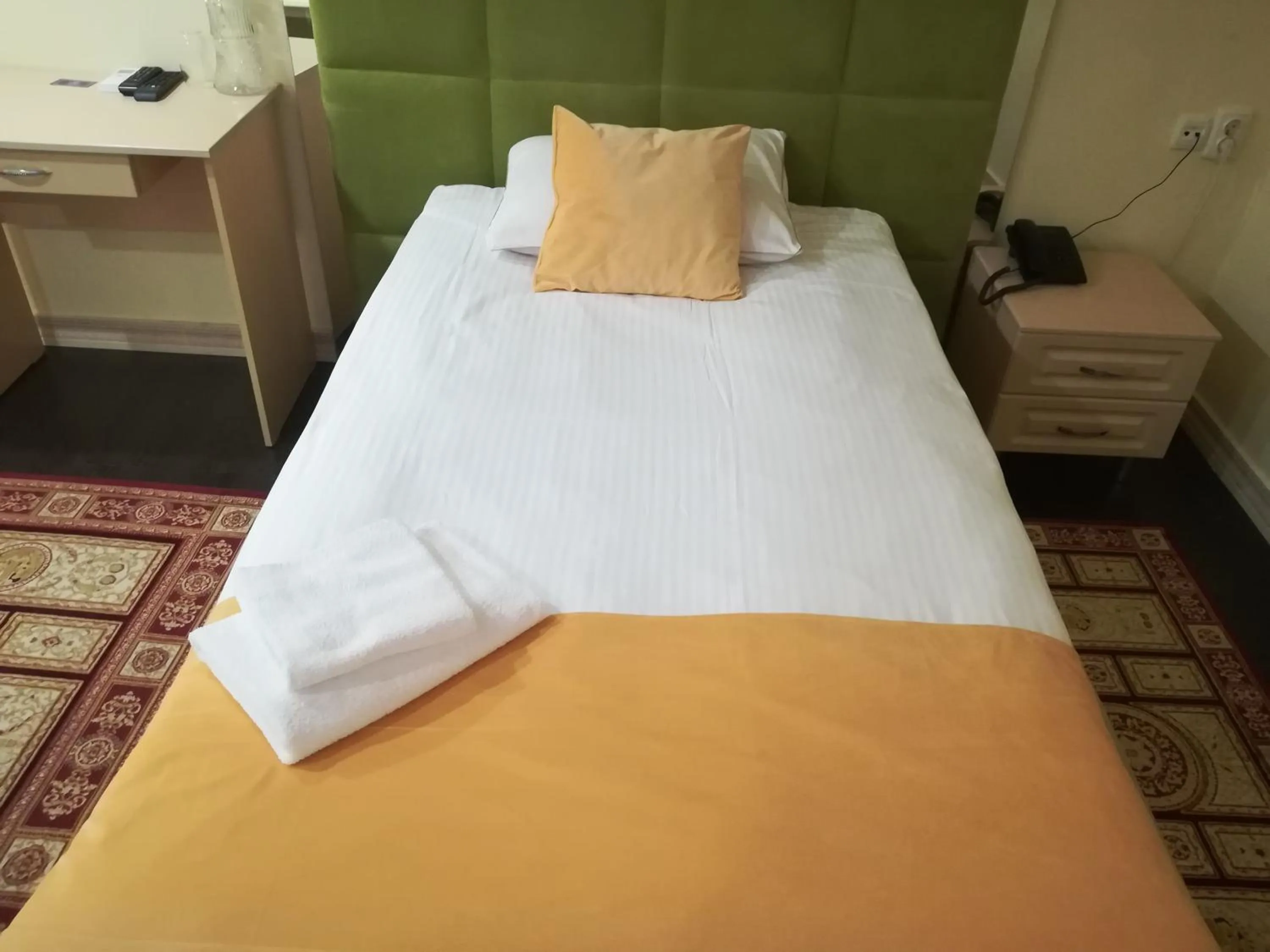 Bed in Jasmine Hotel