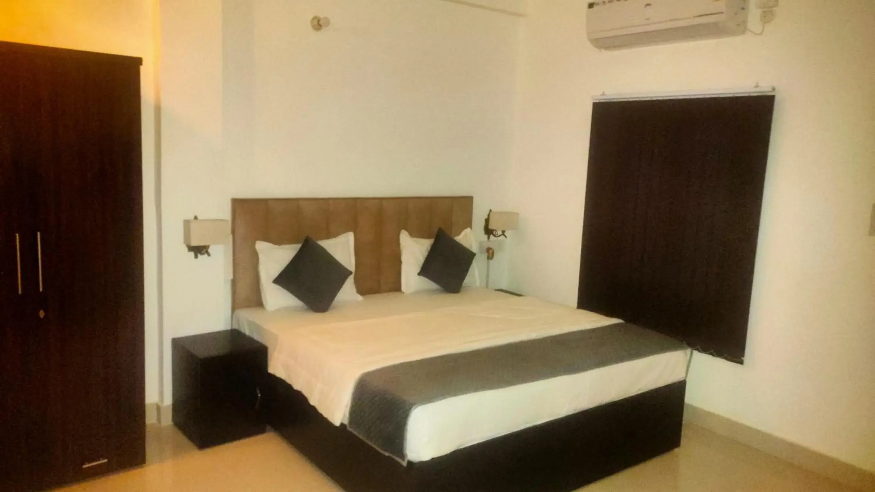 Deluxe Single Room with Balcony - single occupancy in Rudraksh Paradise Deluxe Single Room with Balcony - single occupancy in Rudraksh Paradise