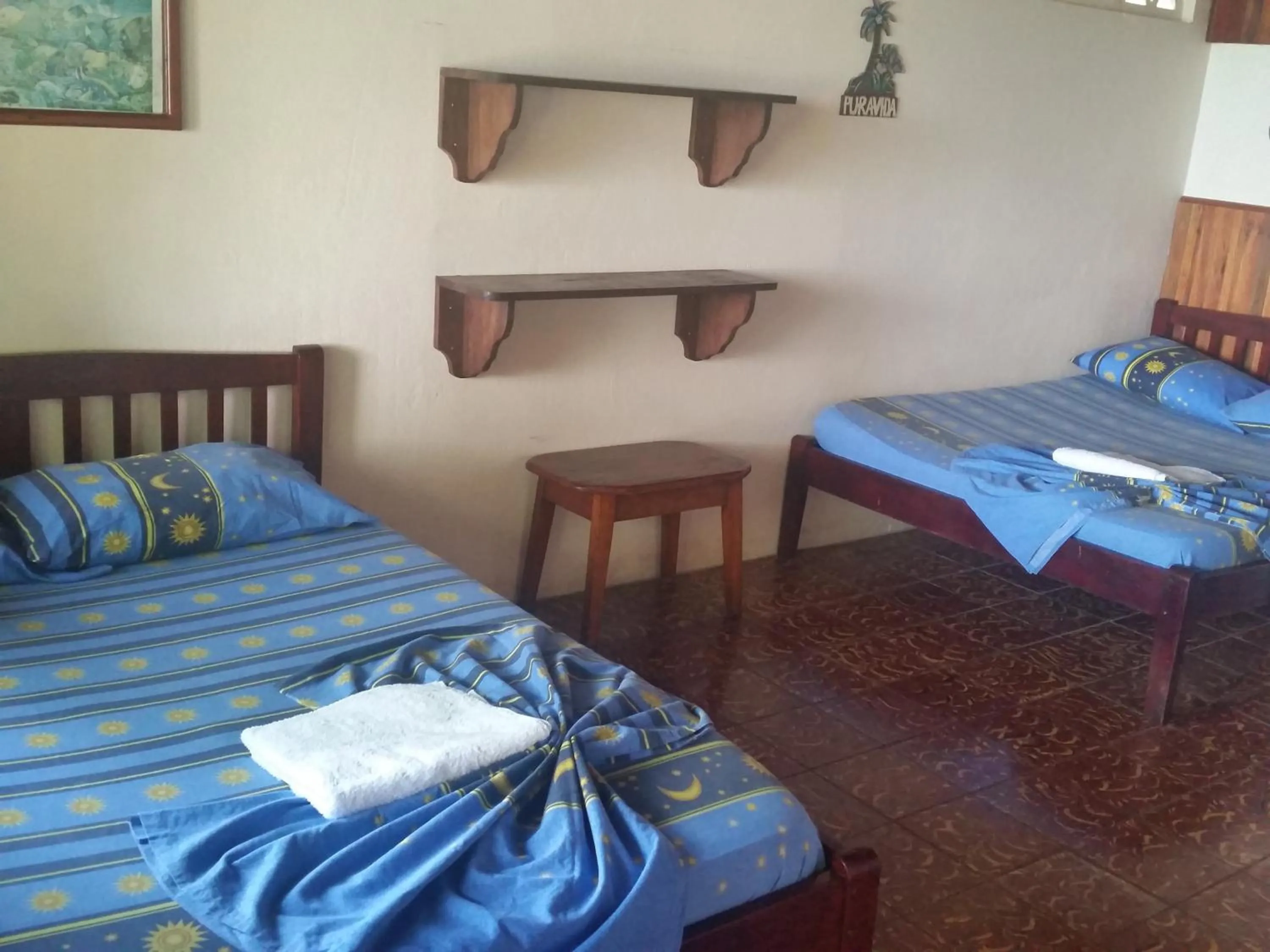 Photo of the whole room, Bed in Hotel Cabinas Mar Y Cielo